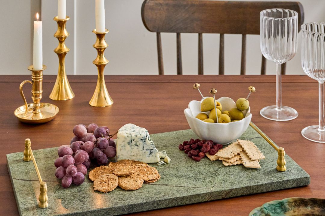 Shop serveware. Image features an heirloom serving bowl on a wooden riser.