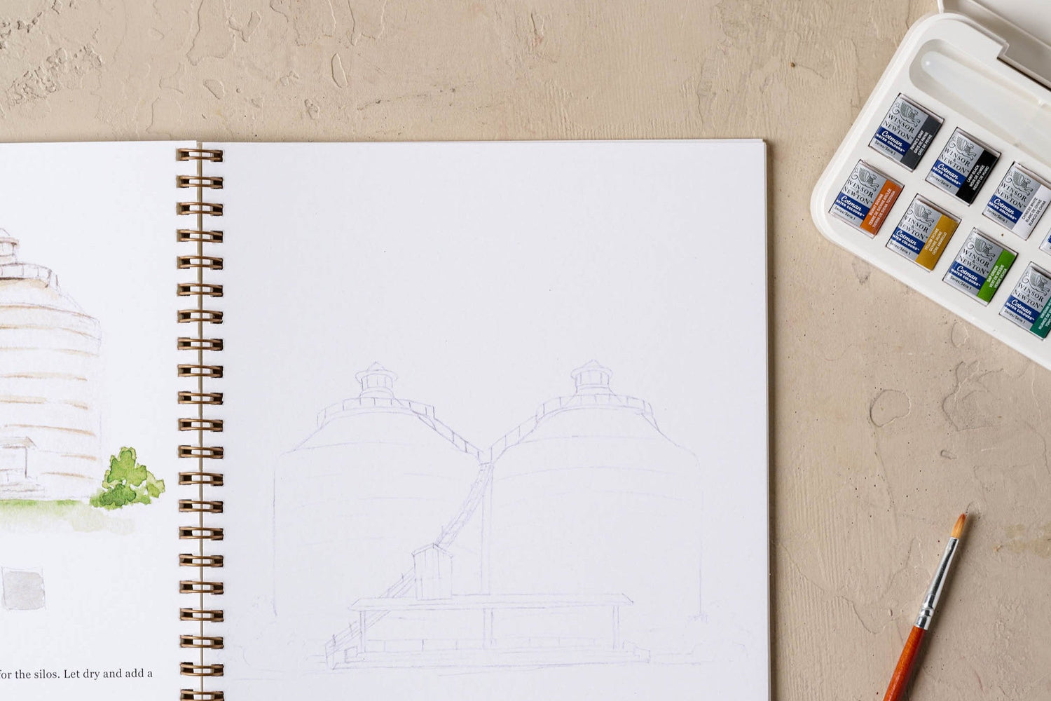 Shop crafts, games and hobbies. Image features a watercolor workbook.