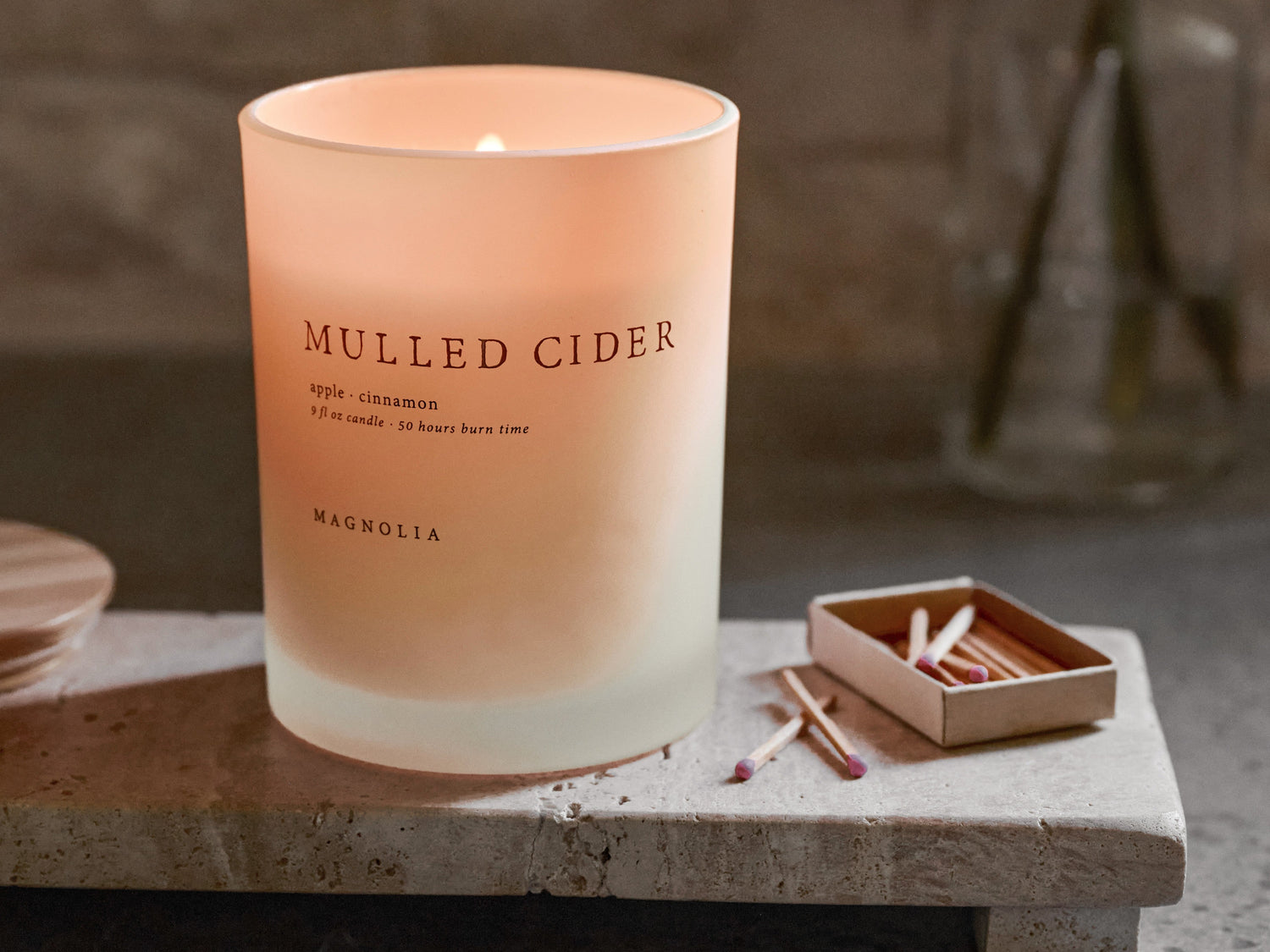Shop magnolia candles. Mulled cider candles featured set on a stone riser