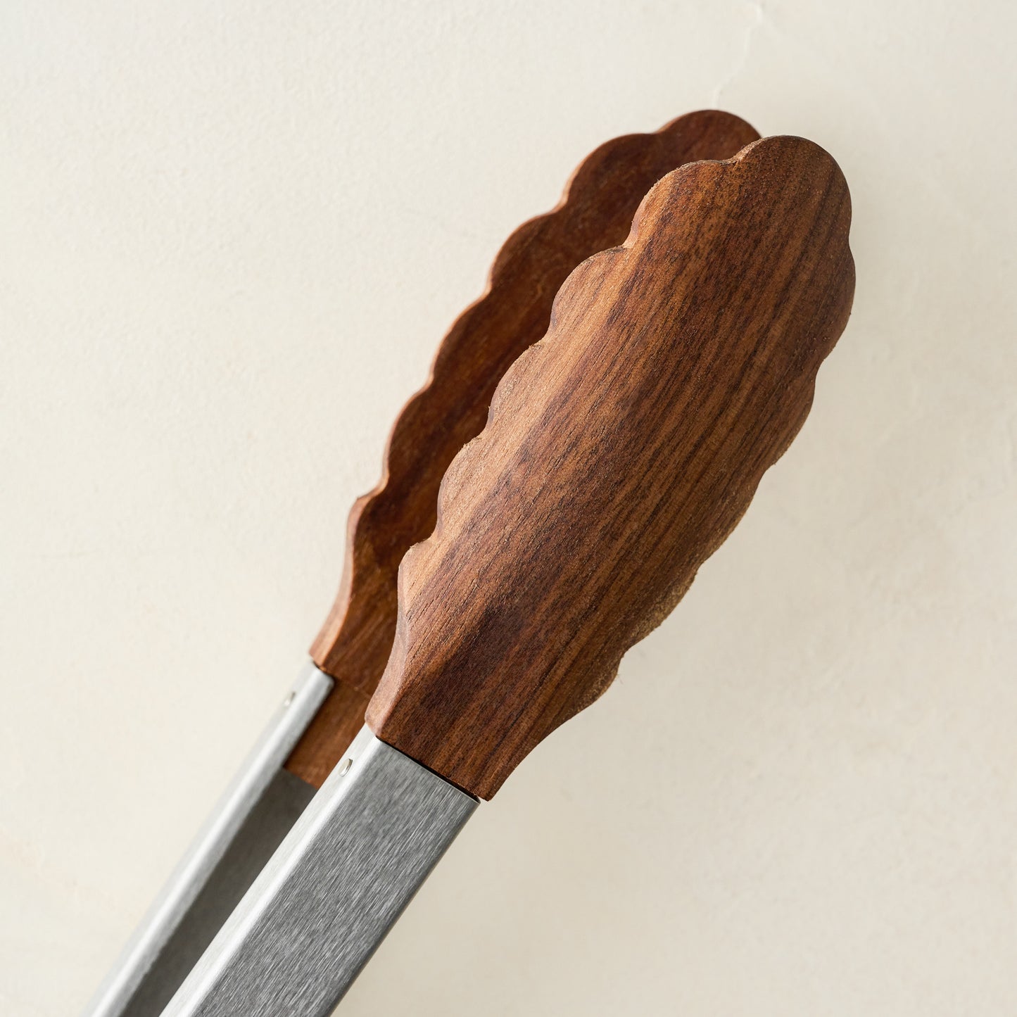 Gristmill Collection Walnut Tip Salad Tosser close up of wood tossers