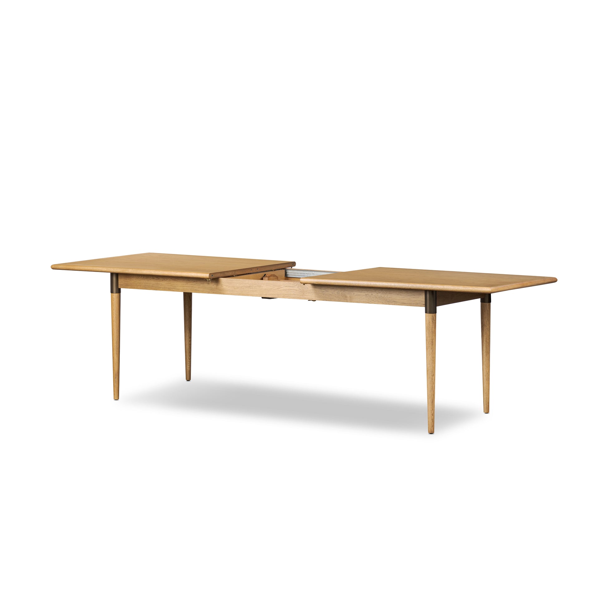 Piper Extension Dining Table in Fawn Oak shown extended