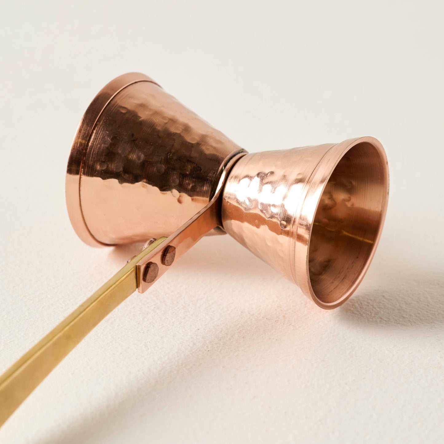 Hammered Copper and Gold Jigger up close