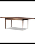 Wooden dining table on a white background