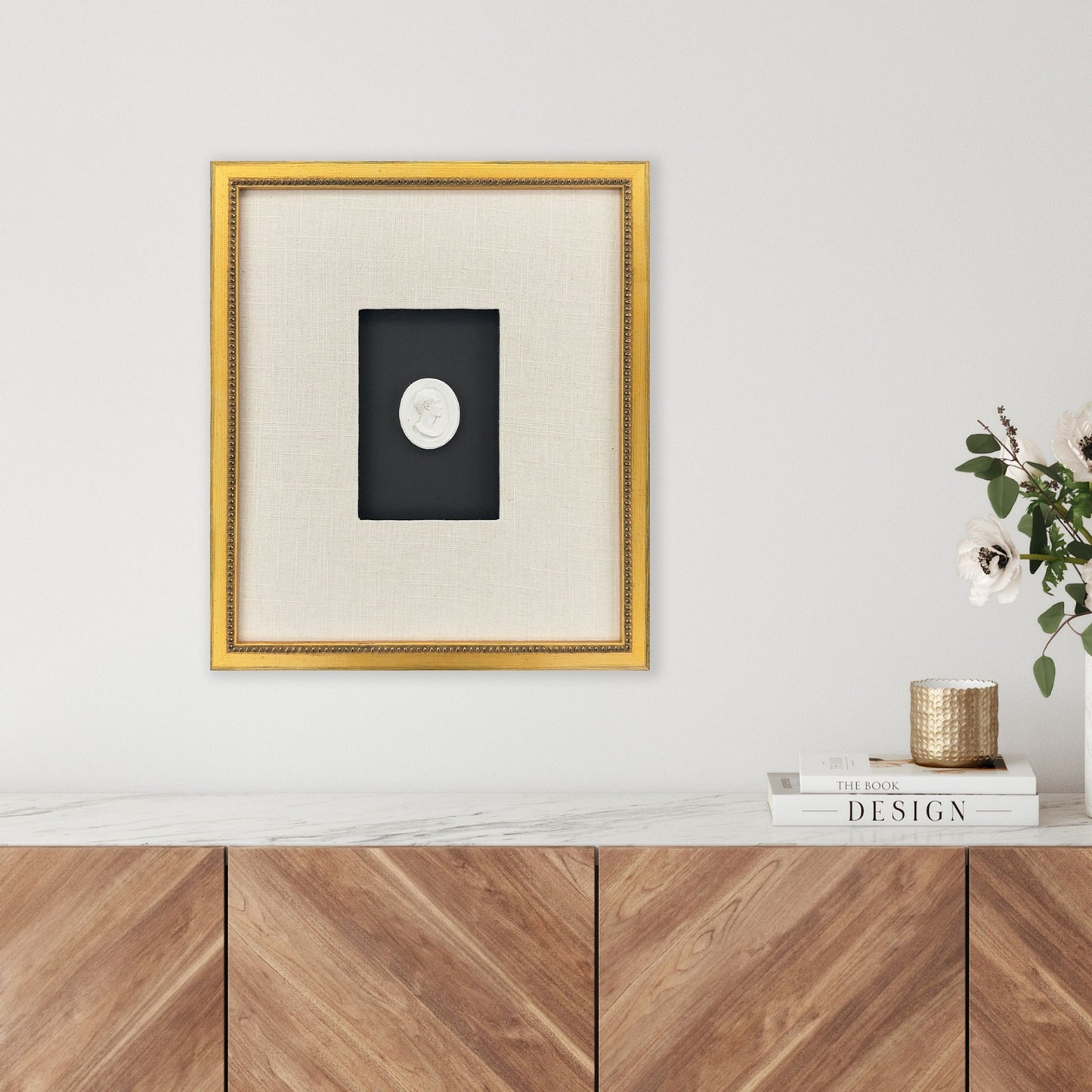 Framed Intaglio I shown hung on wall above dresser