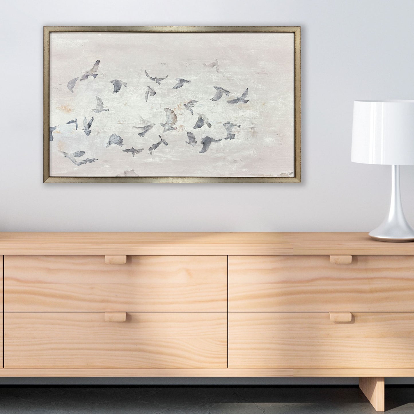 Migration shown hung on wall above dresser