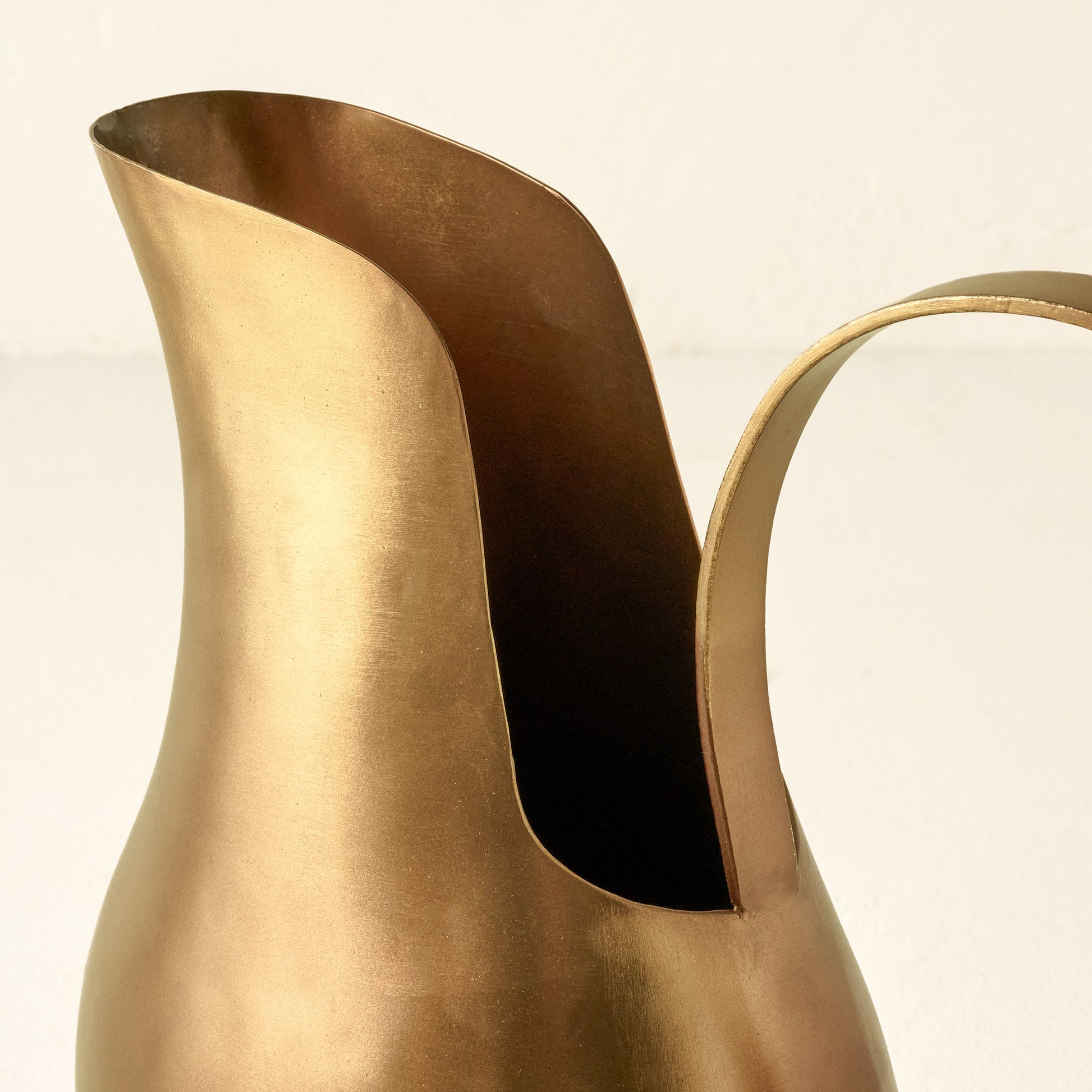 Antique Brass Pitcher Vase up close