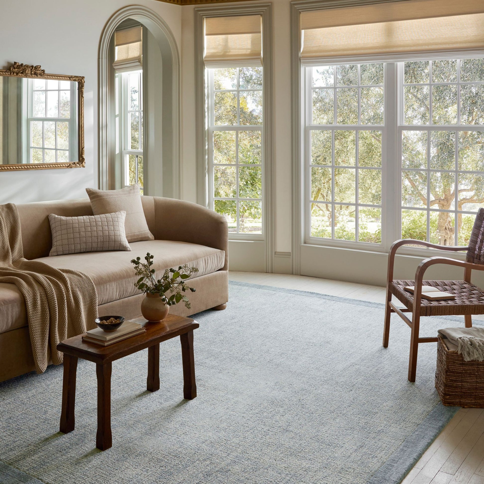 Henley Ivory Blue Rug shown in living room