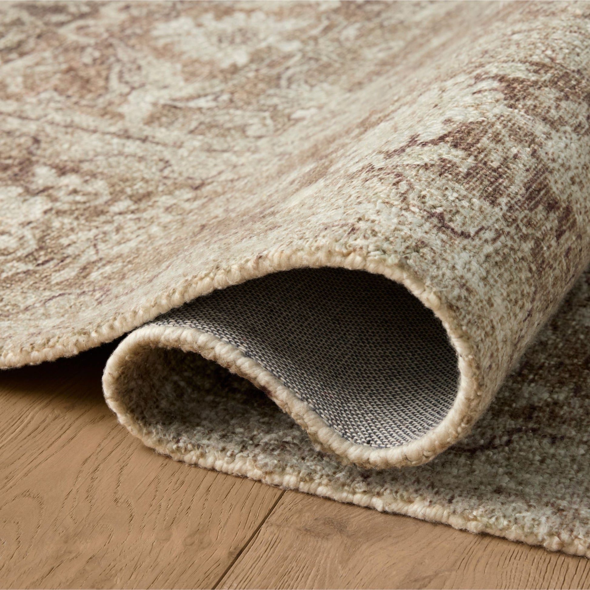 Wimberly Bark Ivory  Rug shown rolled/flipped