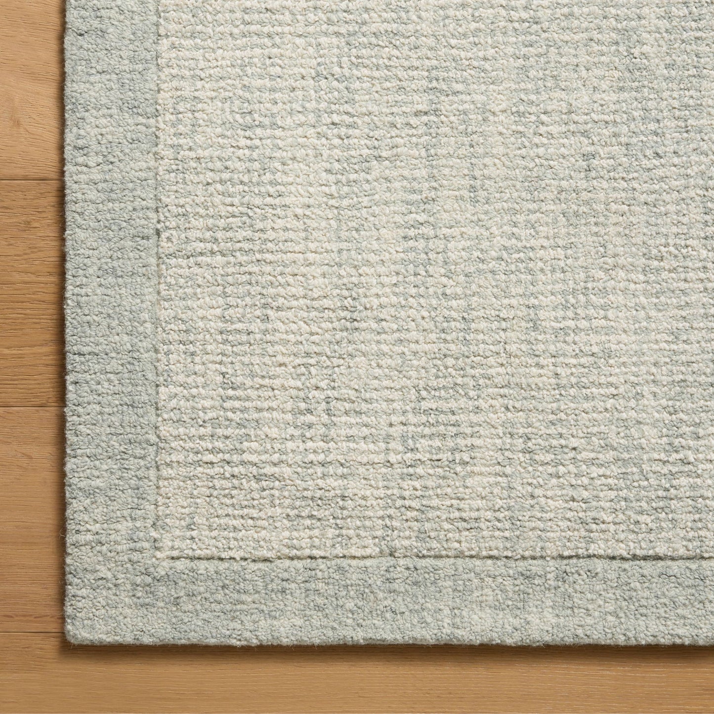 Henley Ivory Spa Rug corner up close