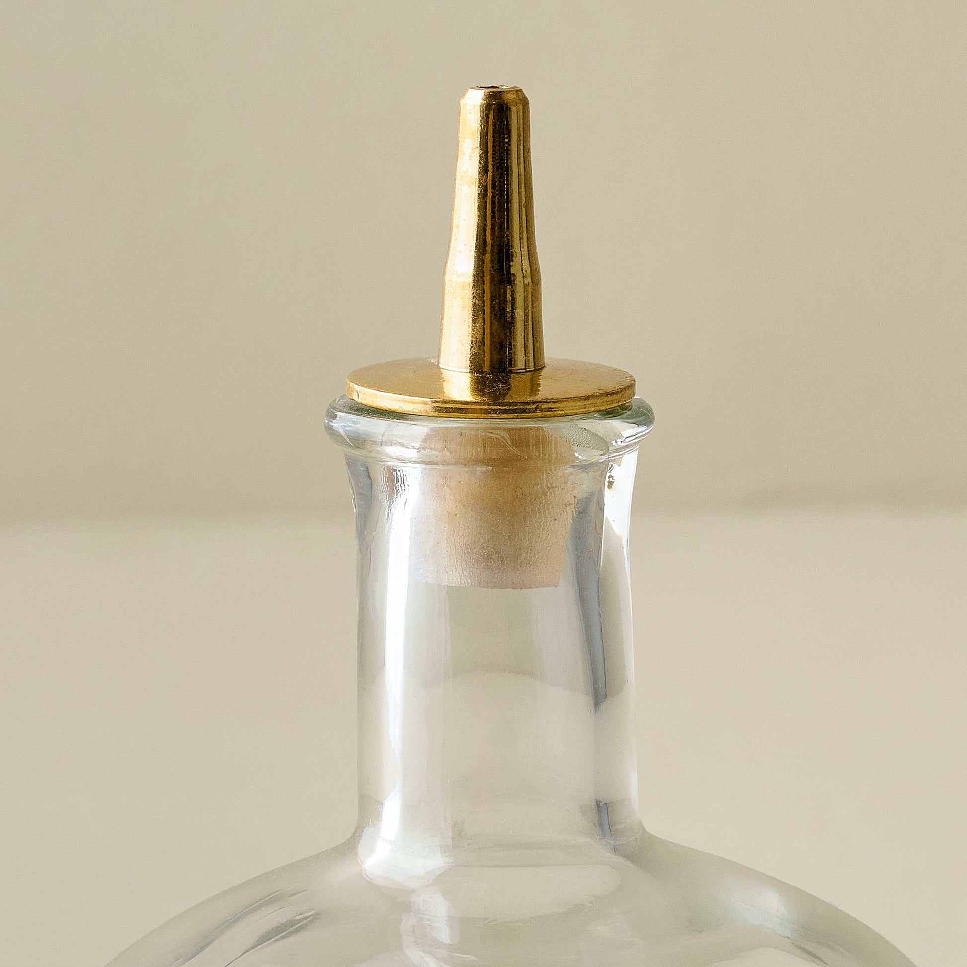 Round Vintage-Inspired Etched Glass Bottle up close