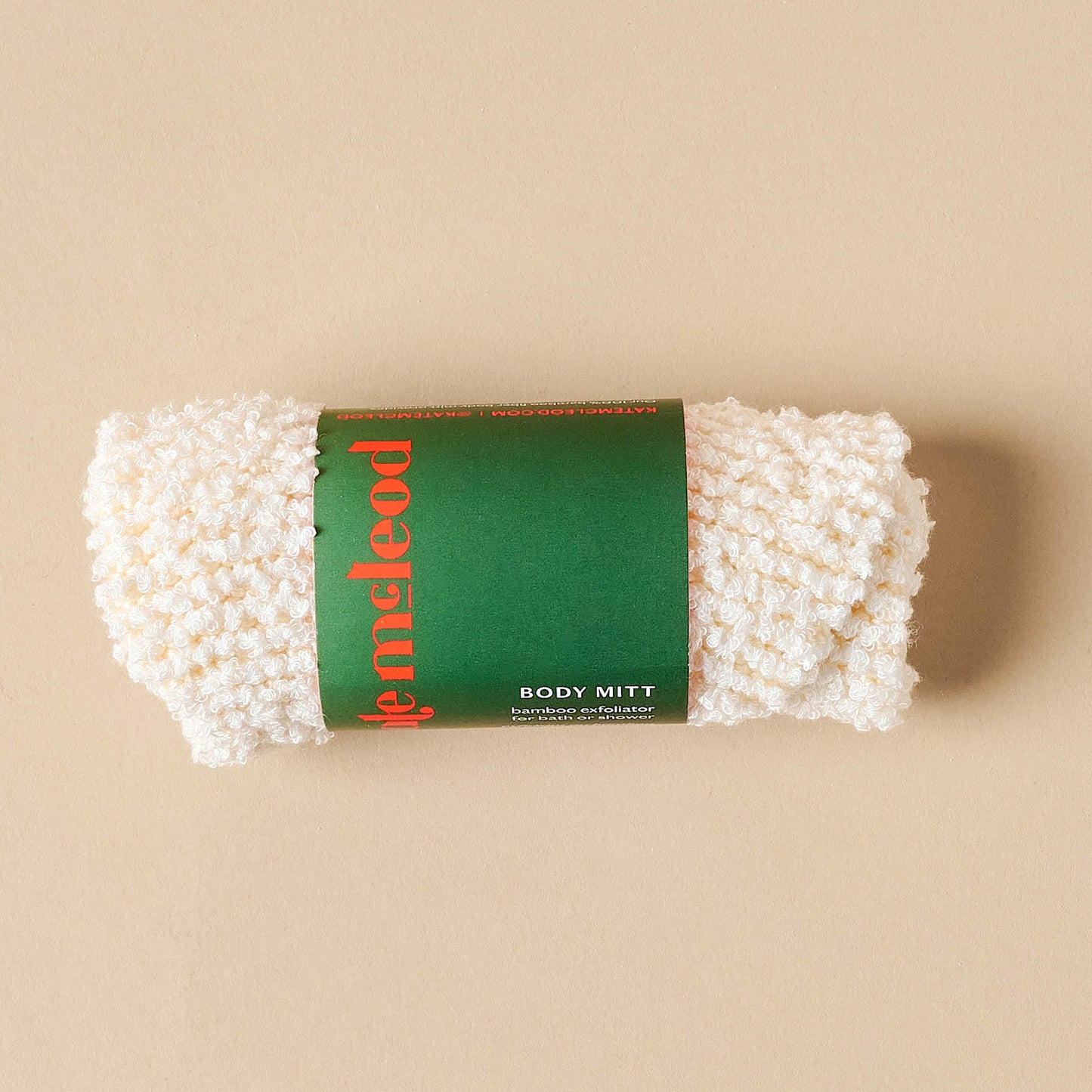 Kate Mcleod Body Mitt rolled up in packaging