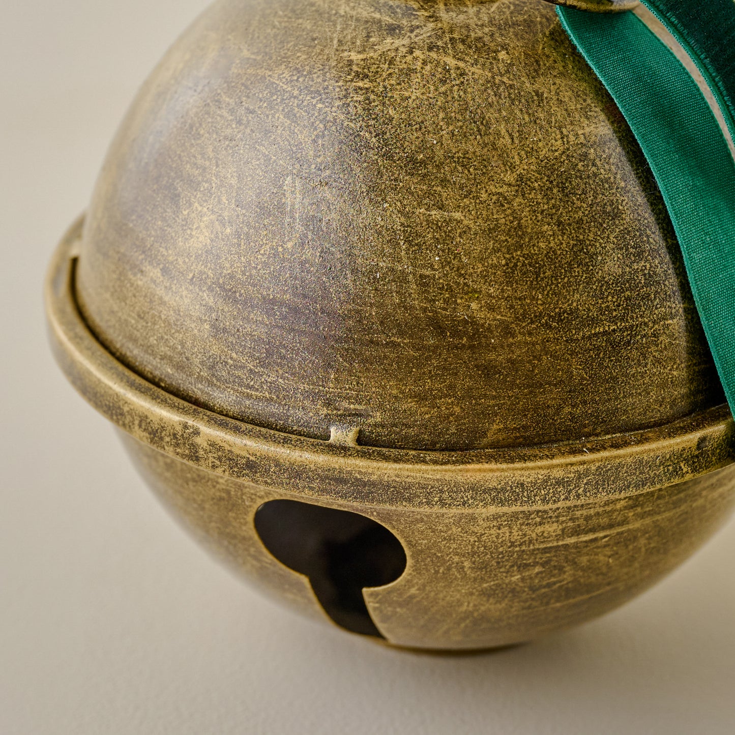 Antiqued Brass Jingle Bell Sit About up close