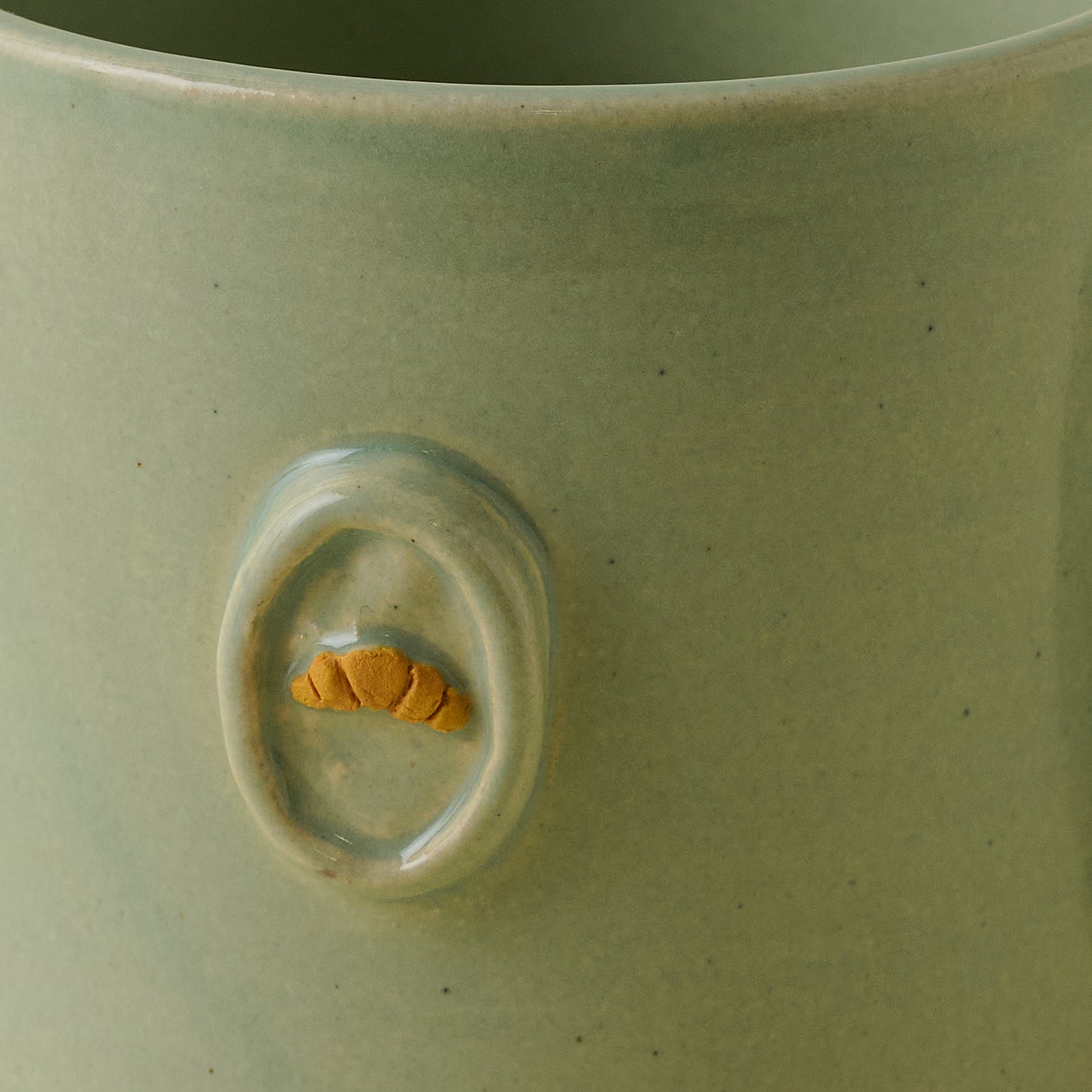 Black Oak Magnolia Press Croissant Mug up close