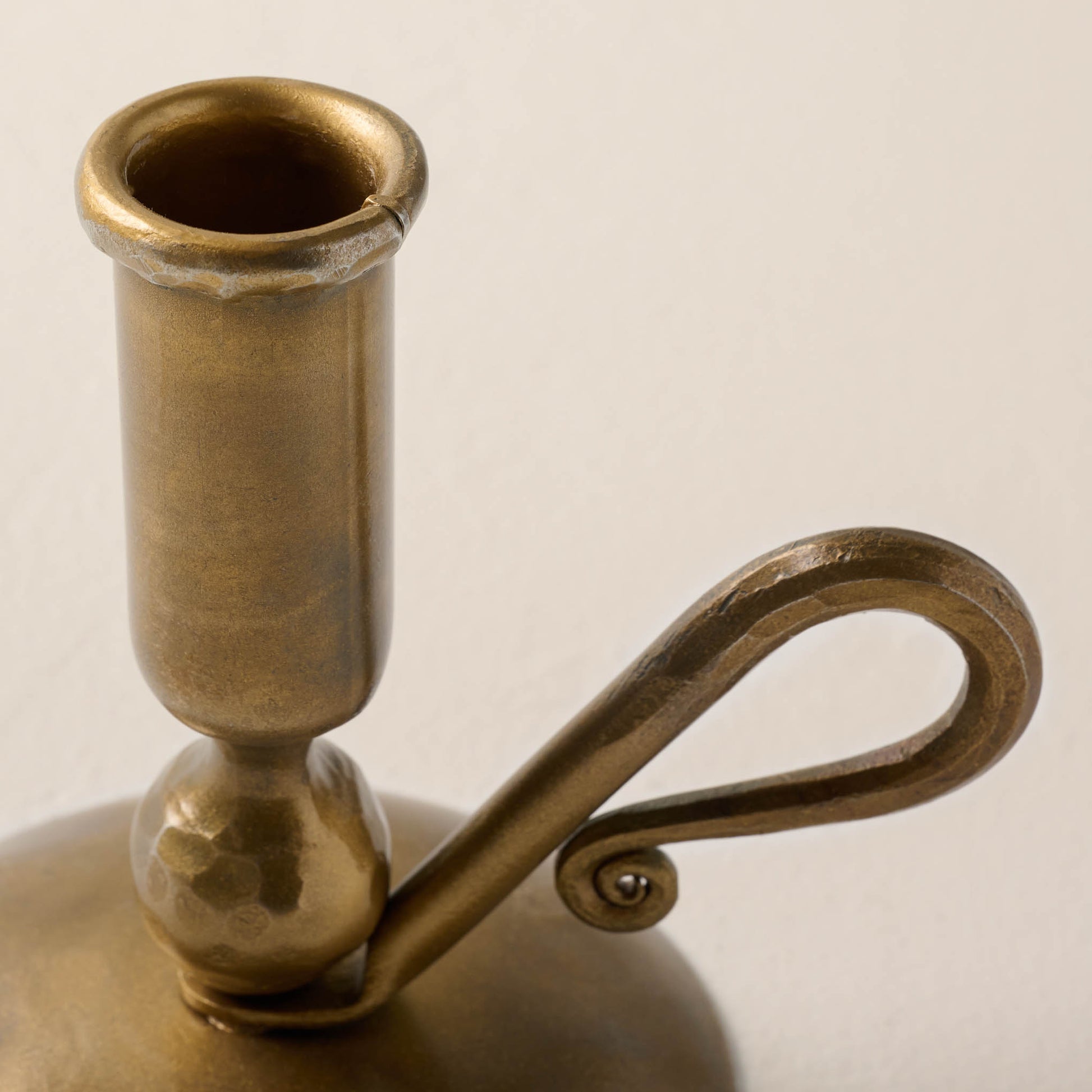 close up view of brass wright taper holder