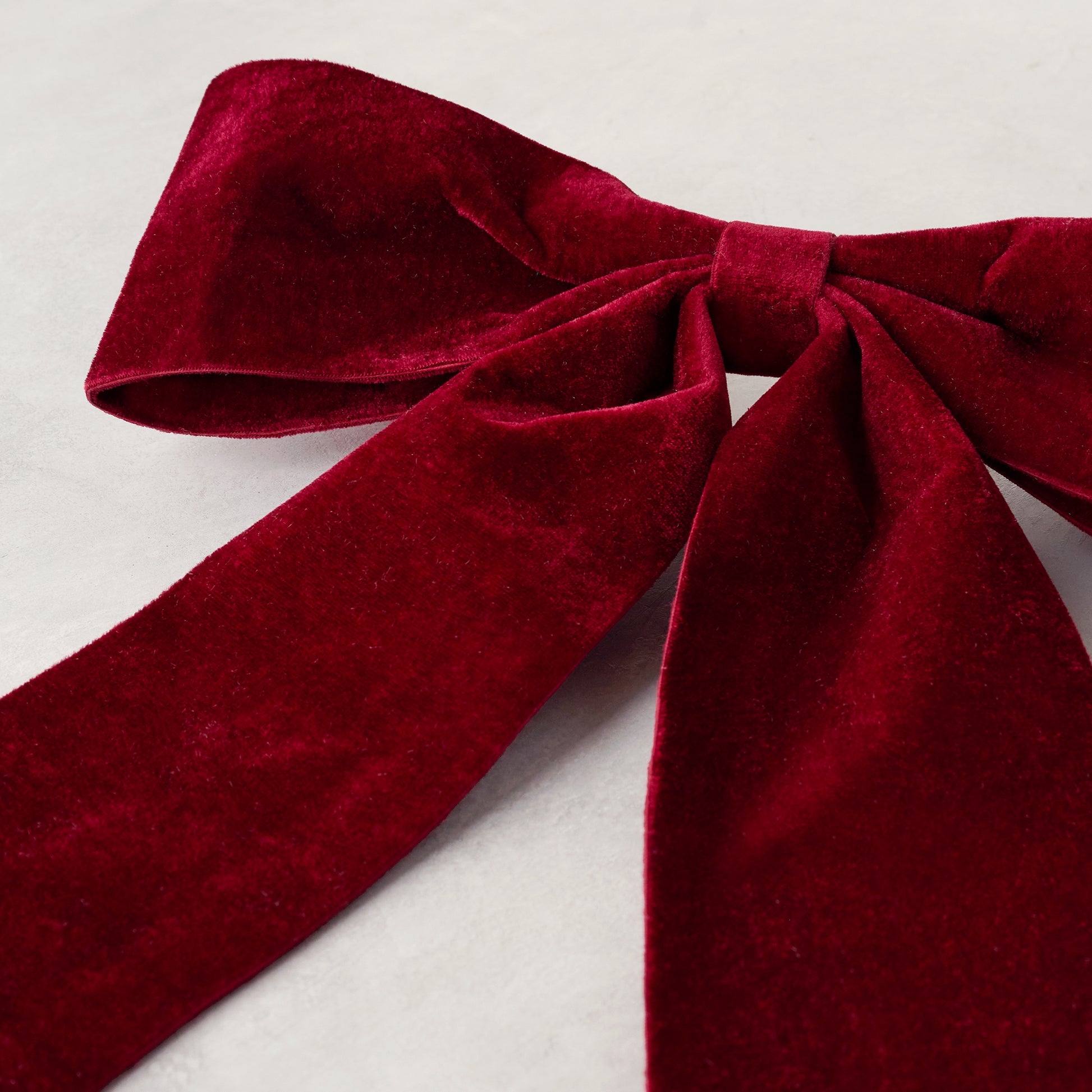 Red Bountiful Bow Tree Topper up close