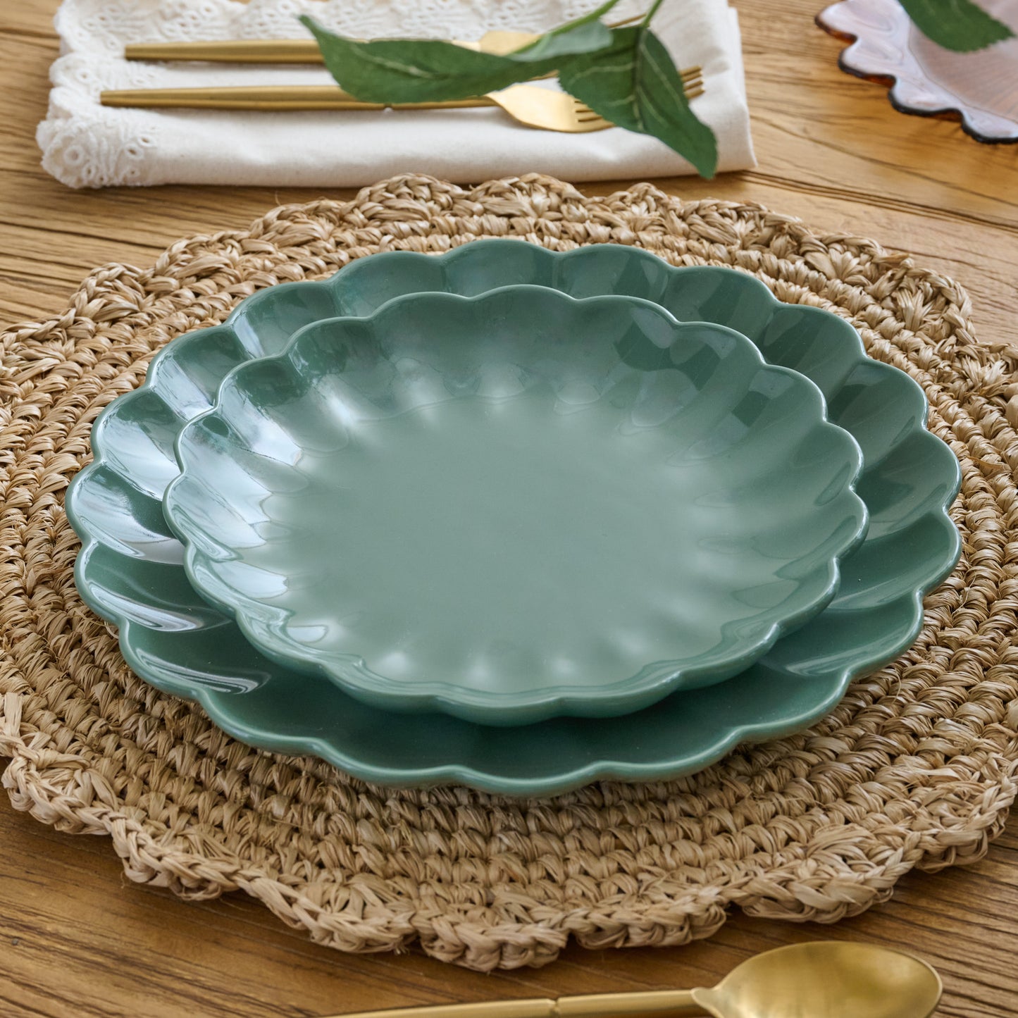 Seagrass Scalloped dessert Plate shown on table