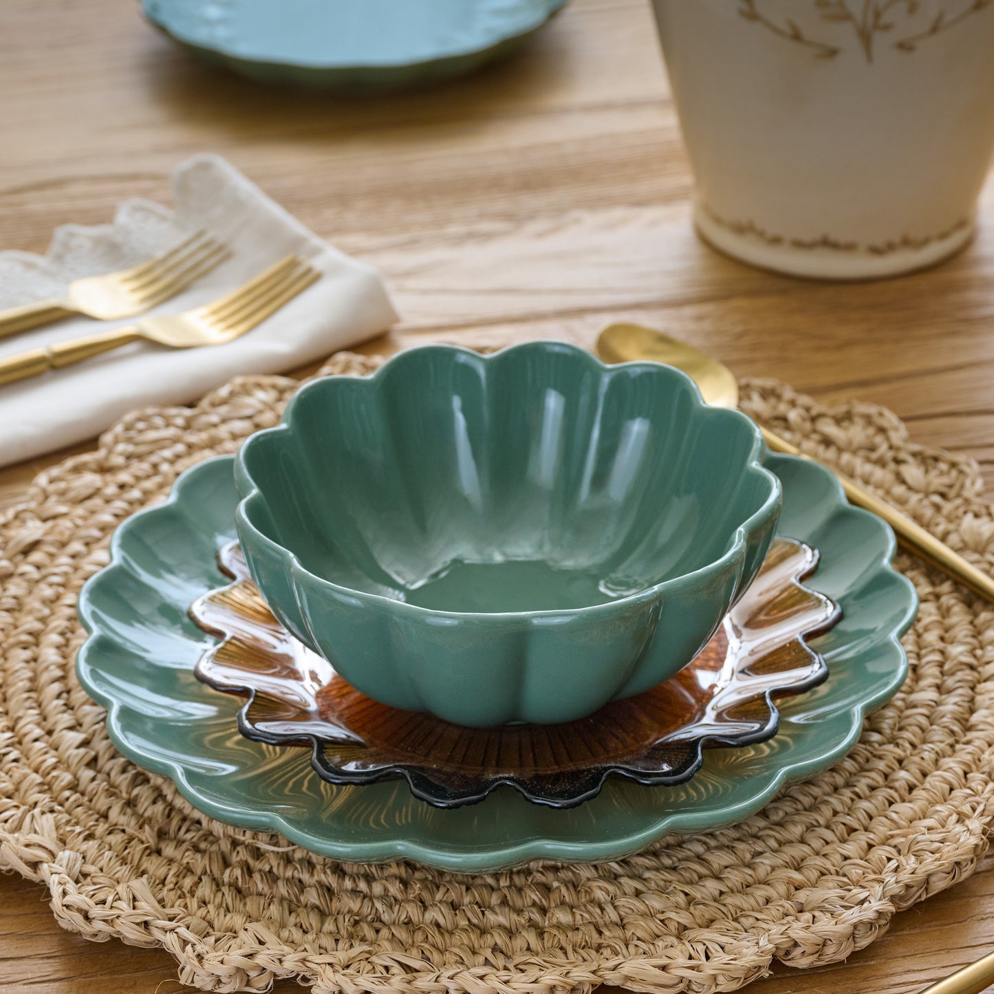 Seagrass Scalloped Cereal Bowl shown on table