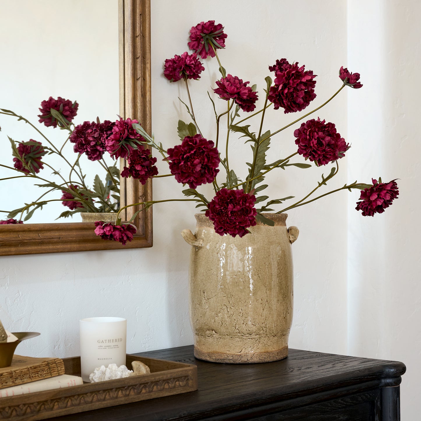Real Touch Red Velvet Scabiosa Stem shown styled on dresser in vase