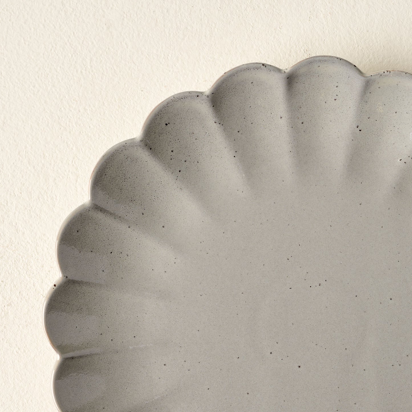 Grey Scalloped Plate close up
