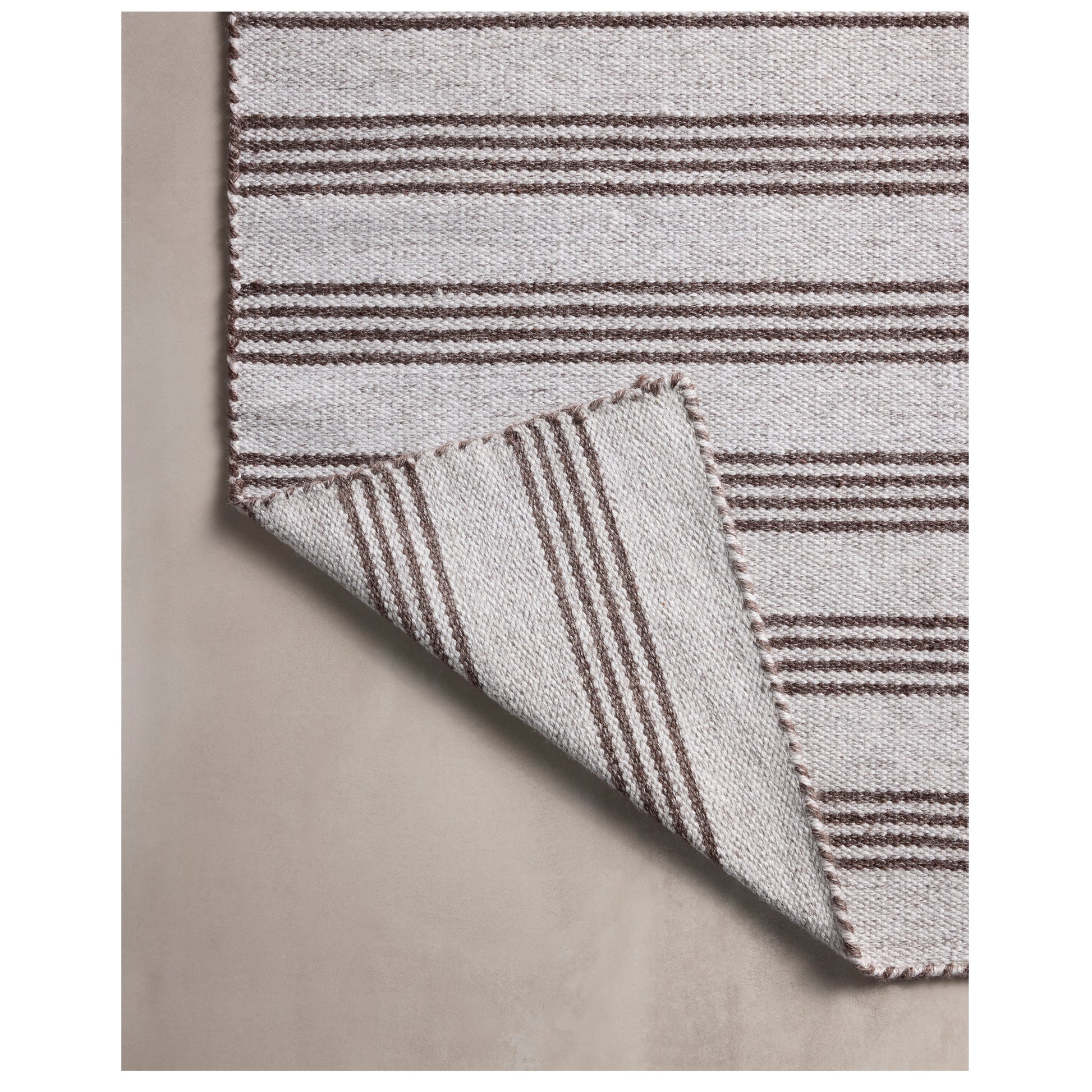 Charlie Silver Bark Rug close up of corner folded back