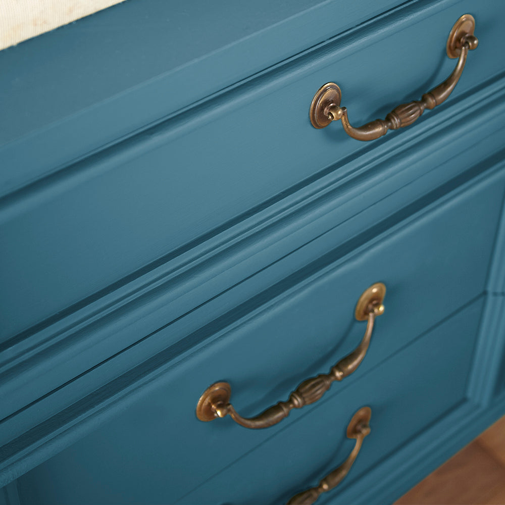 close up view of true lake blue chalk paint named superior shown painted on cabinet