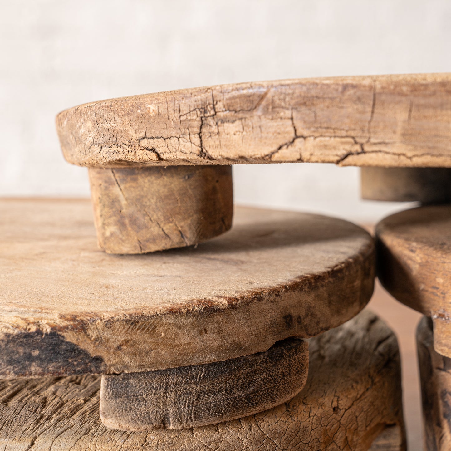 9" Found Wooden Riser shown stacked up close