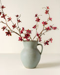 Large Magnolia Bloom Spray shown in green vase