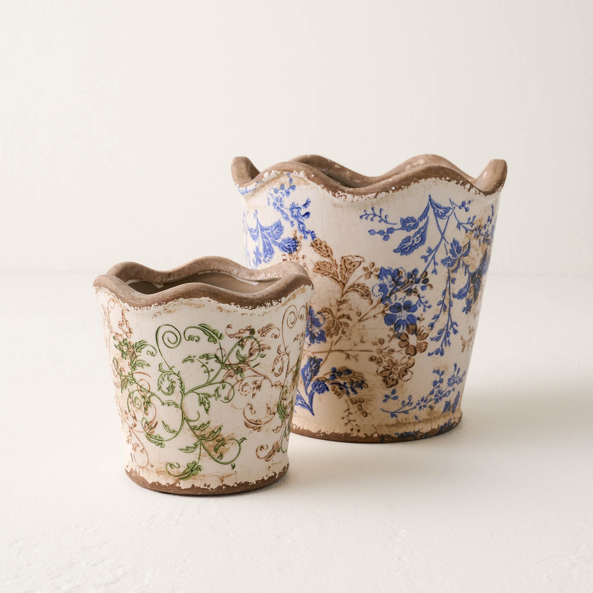Blue Scalloped Distressed Planter with smaller green scalloped distressed planter