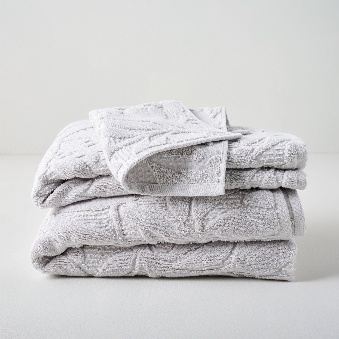 Platinum Esme Floral Towels shown stacked