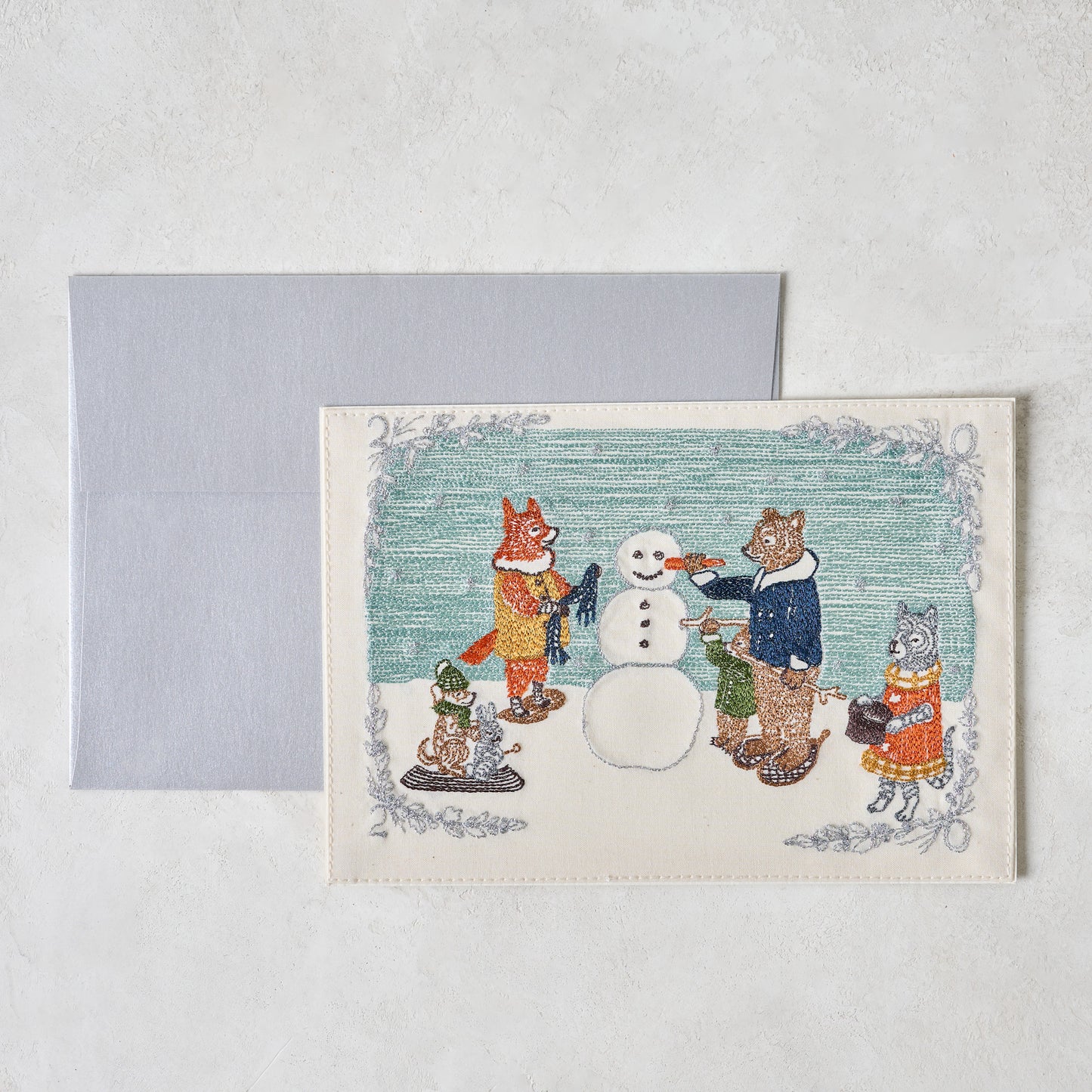 Embroidered Snowman Card shown with envelope