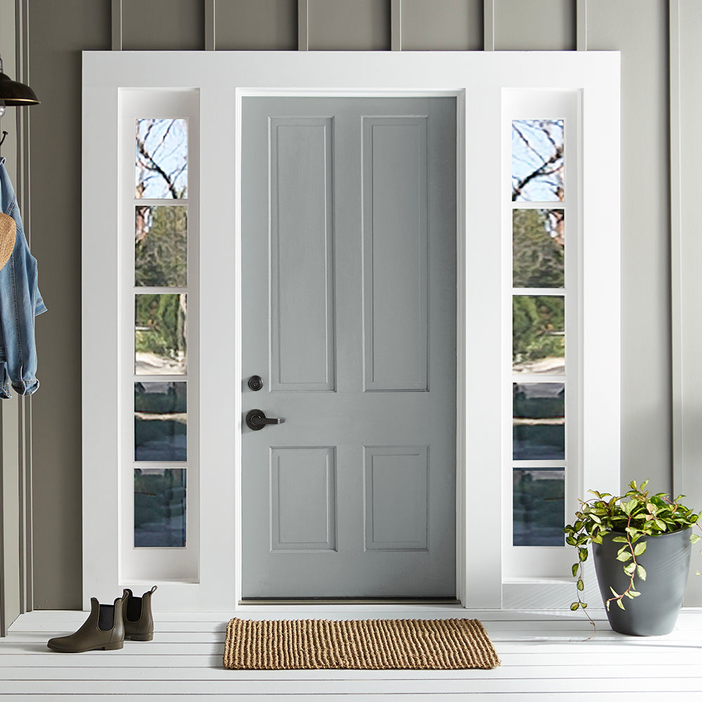 neutral grey with a tinge of blue paint color named tranquil waters shown painted on exterior front door
