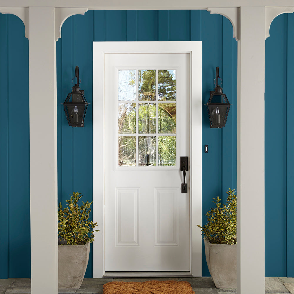 true blue paint color named superior shown painted on exterior siding