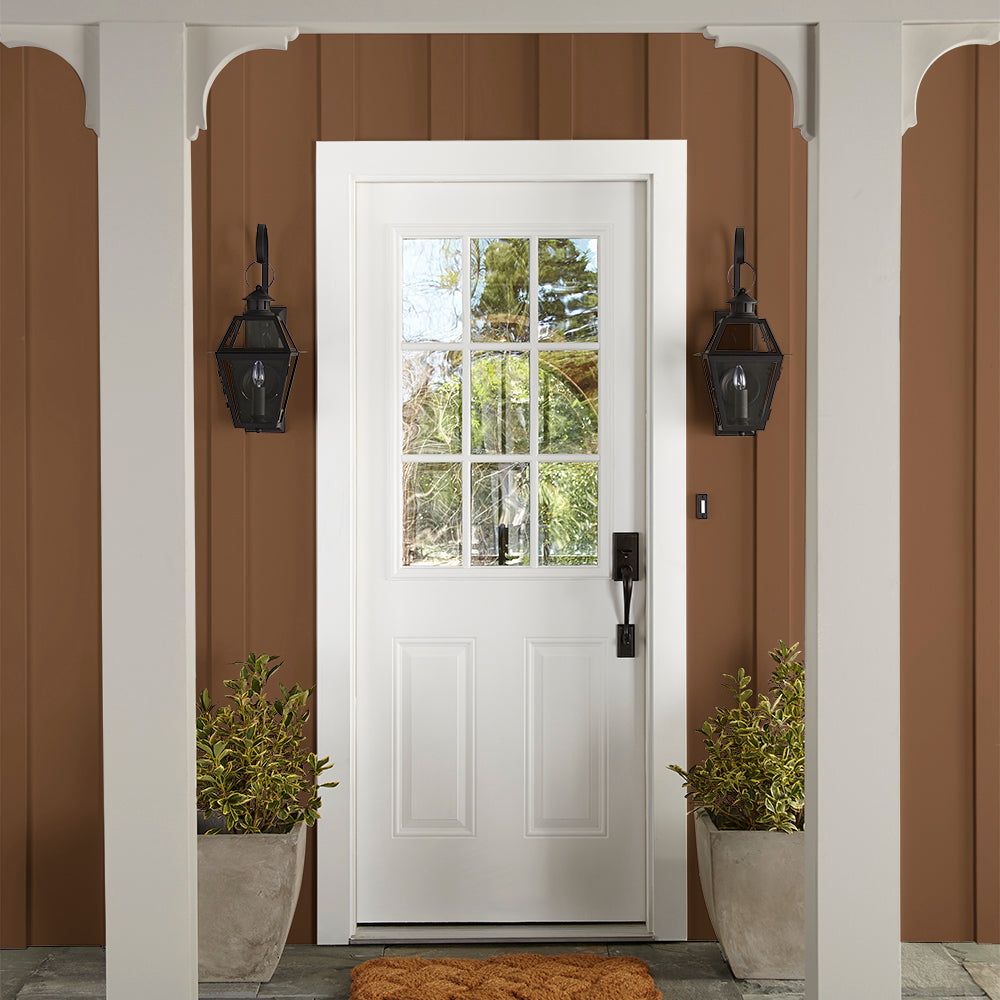 earthy brown with reddish hue paint color named cognac shown painted on exterior trim