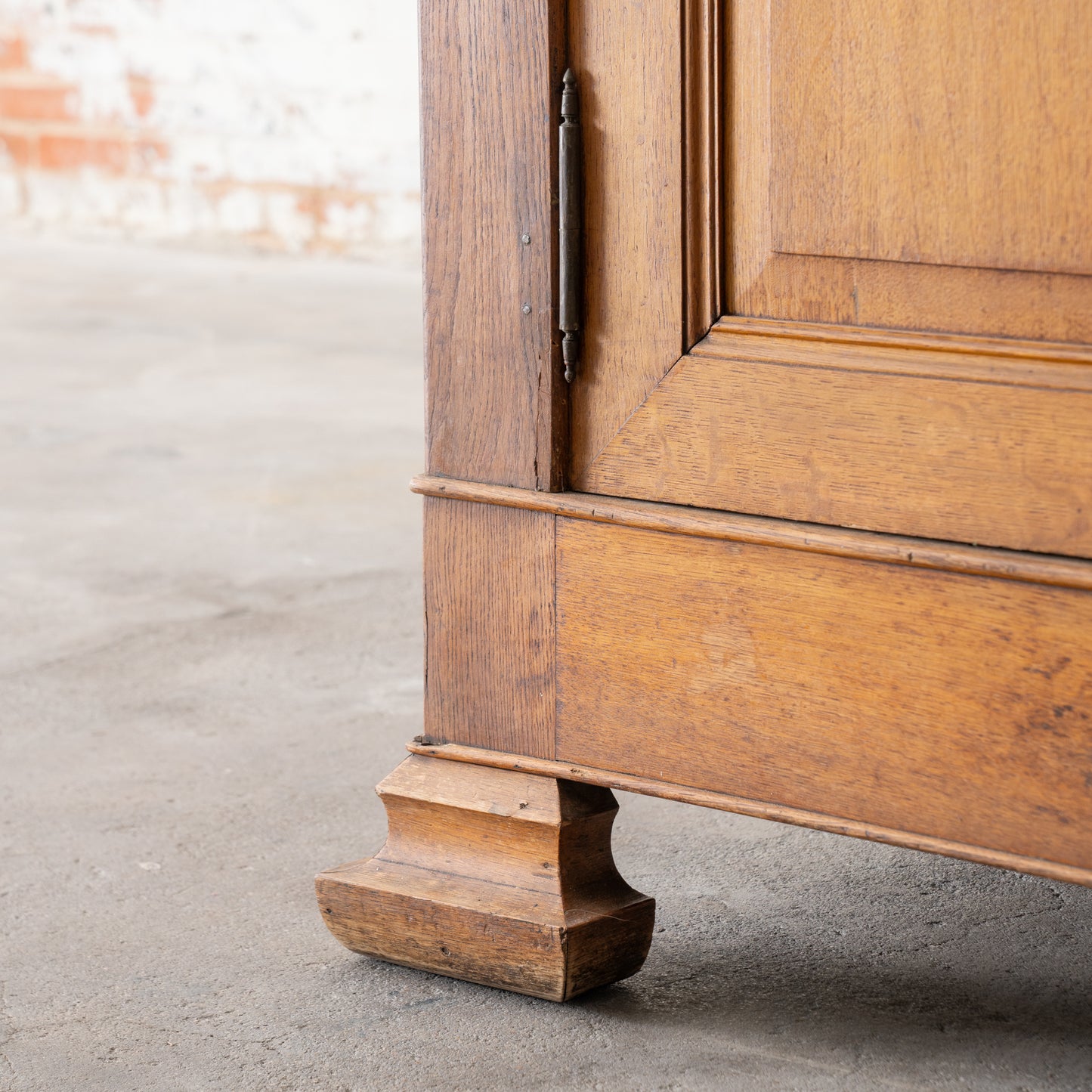 detail view of Antique Solid Wood Armoire foot