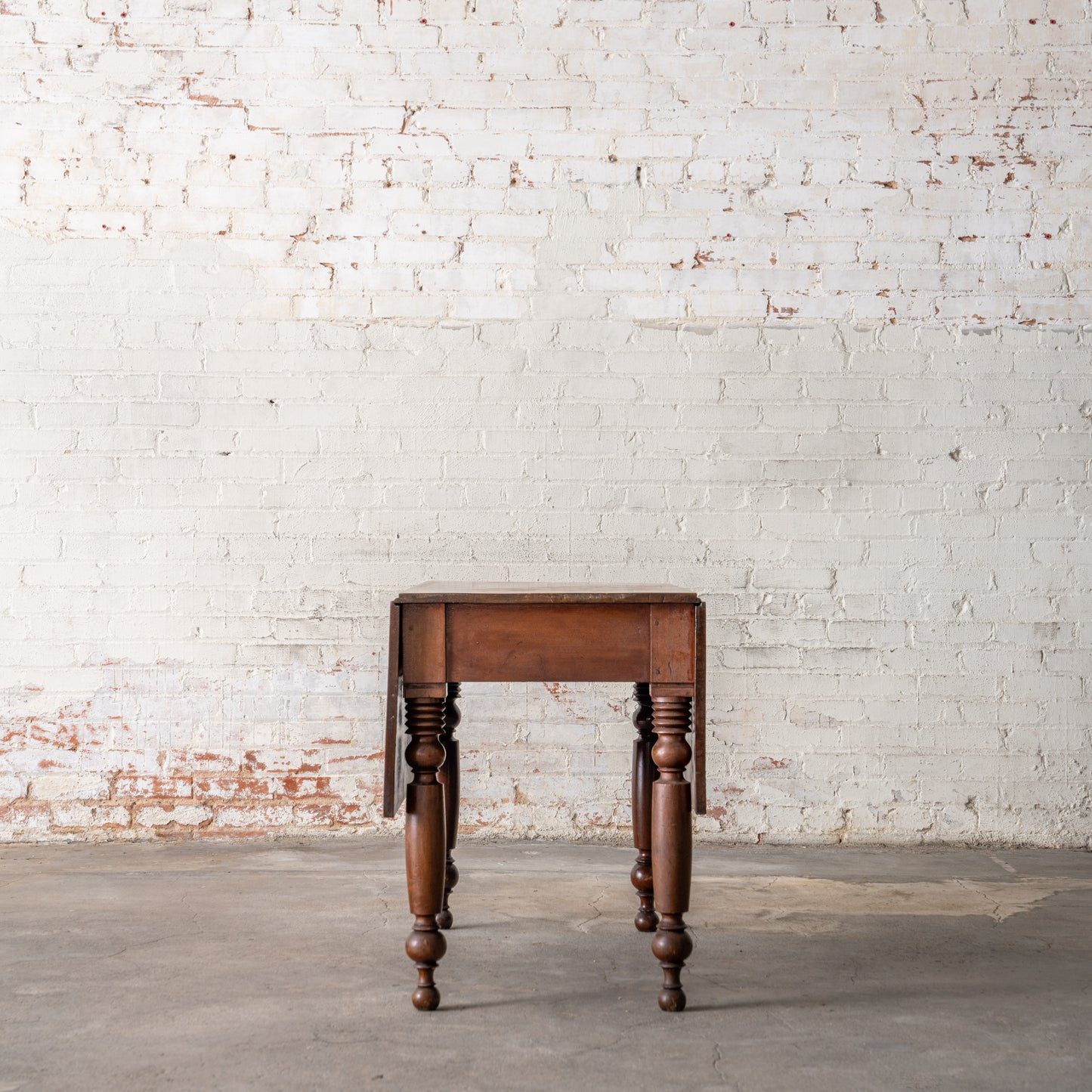 Antique Primitive Drop Leaf Table Circa 1830 shown with leaves down