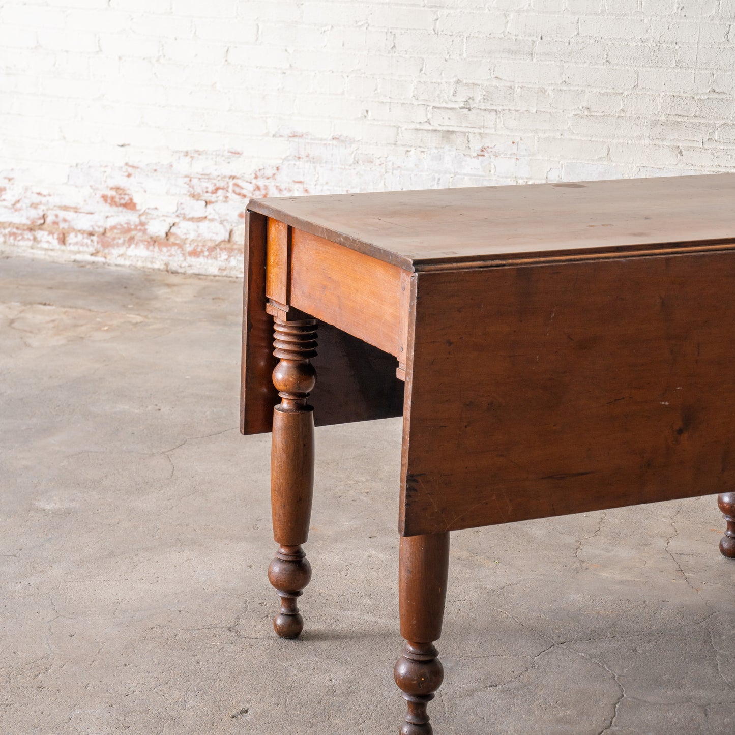 Antique Primitive Drop Leaf Table Circa 1830 shown with leaves down