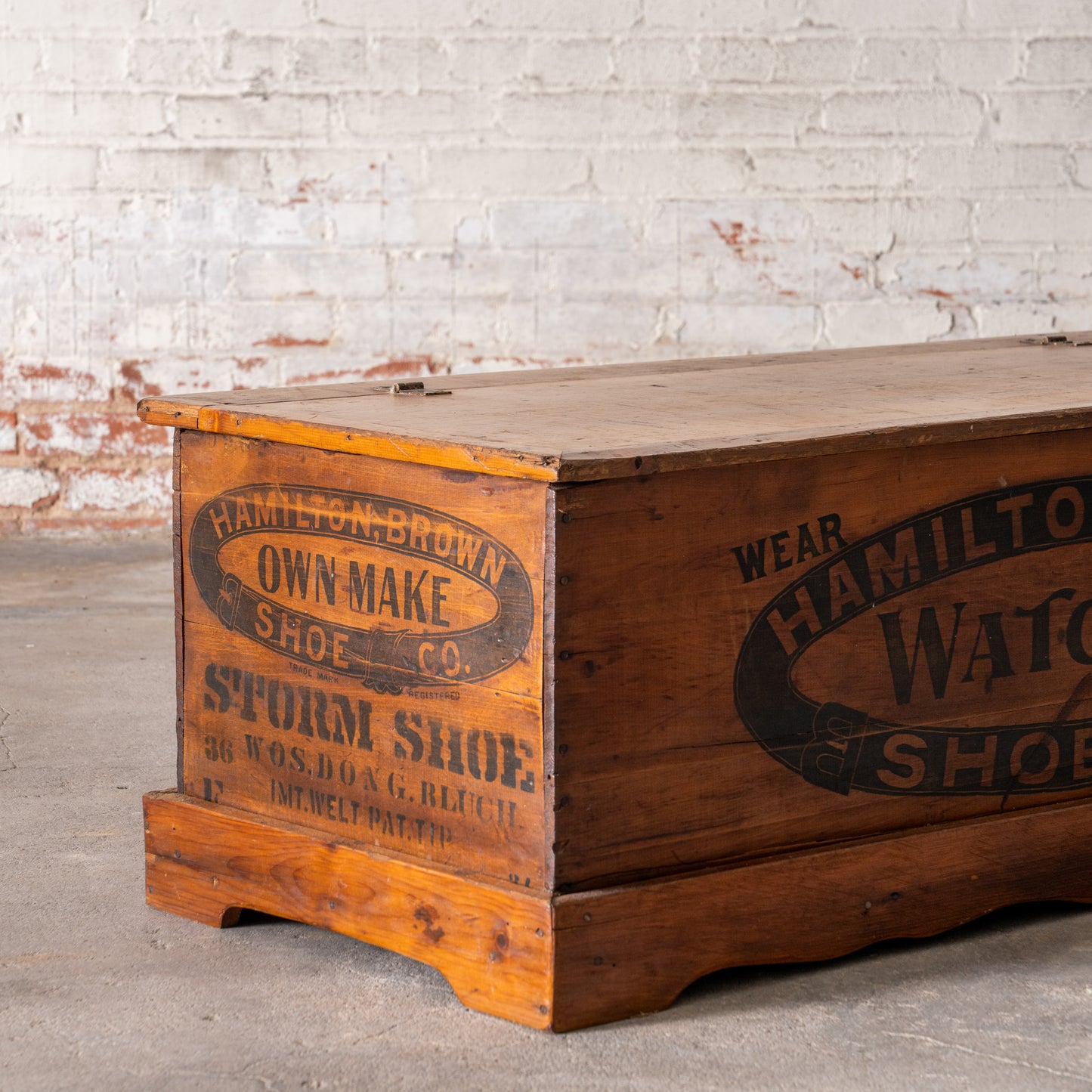 Antique Hamilton Brown Shoe Co. Wooden Trunk corner view showing side and front