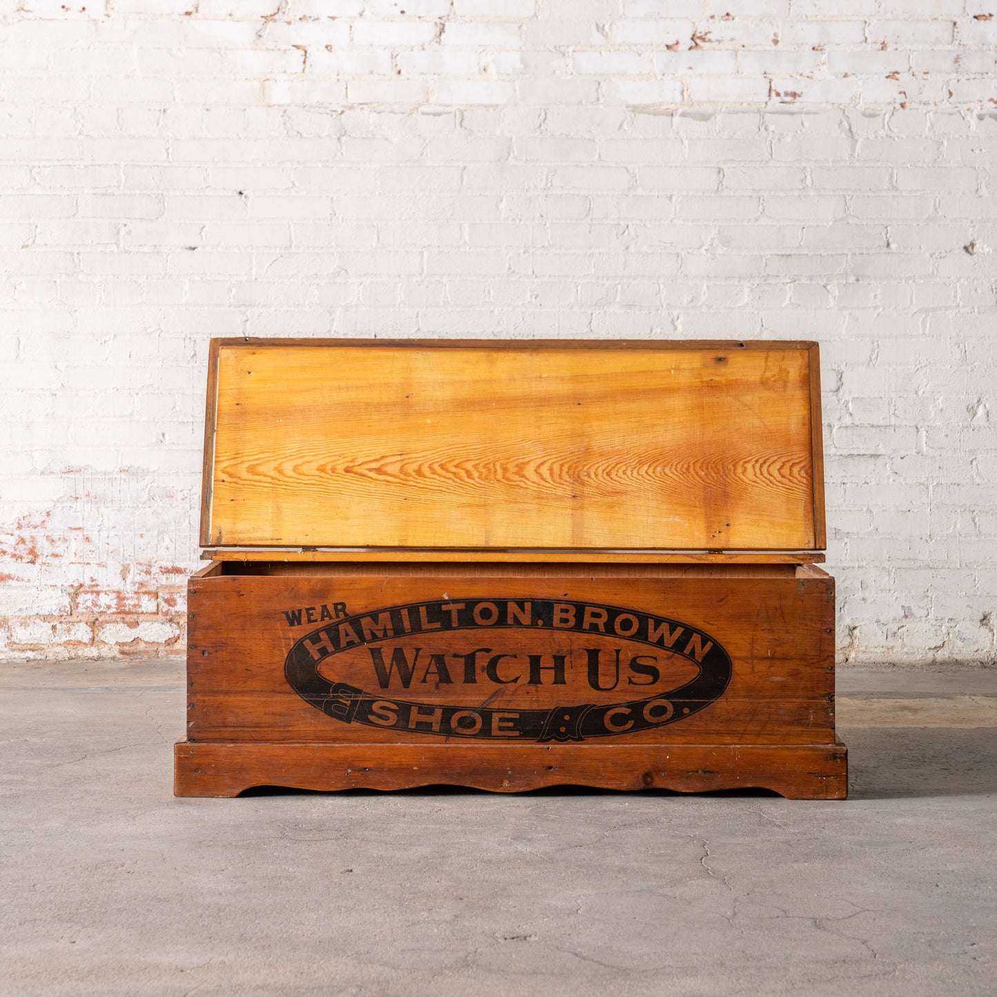 Antique Hamilton Brown Shoe Co. Wooden Trunk shown with top open
