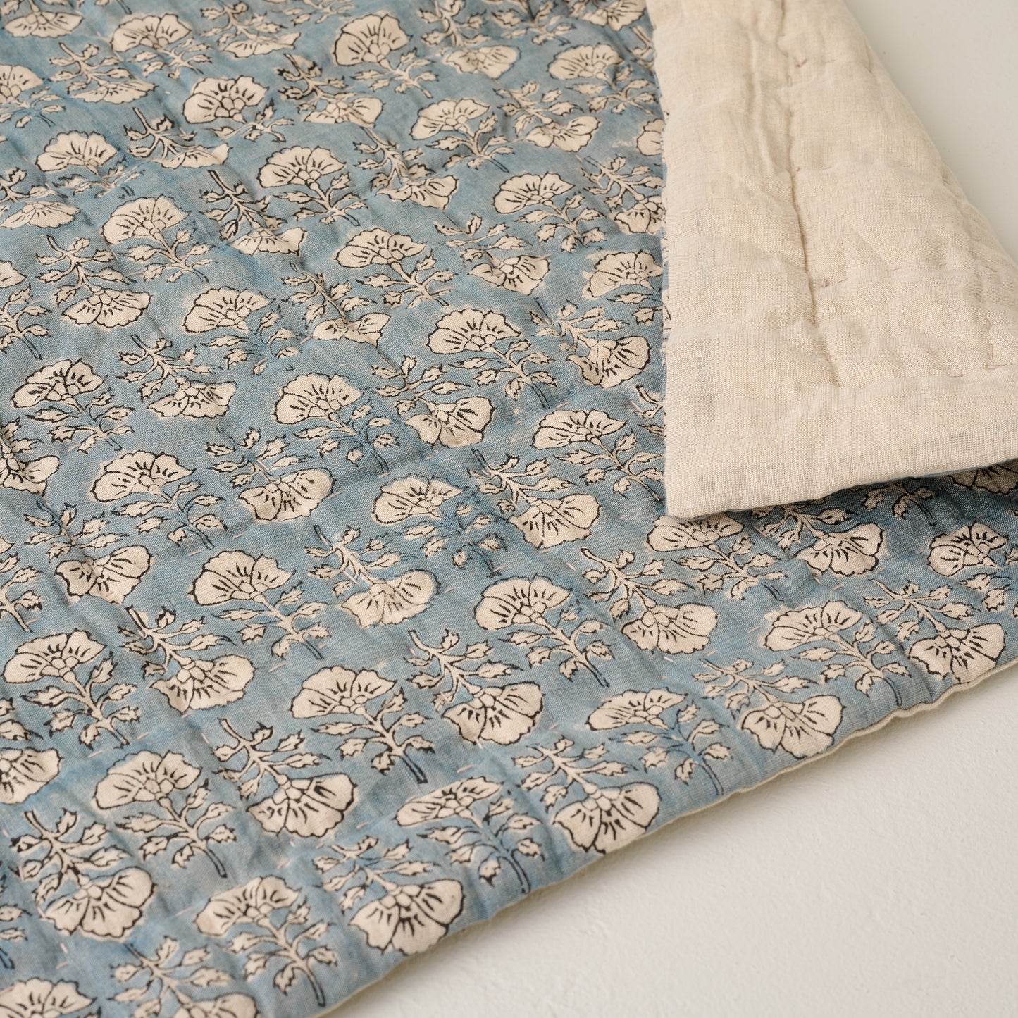 Top view of Flora Block Silver Blue Print Quilt