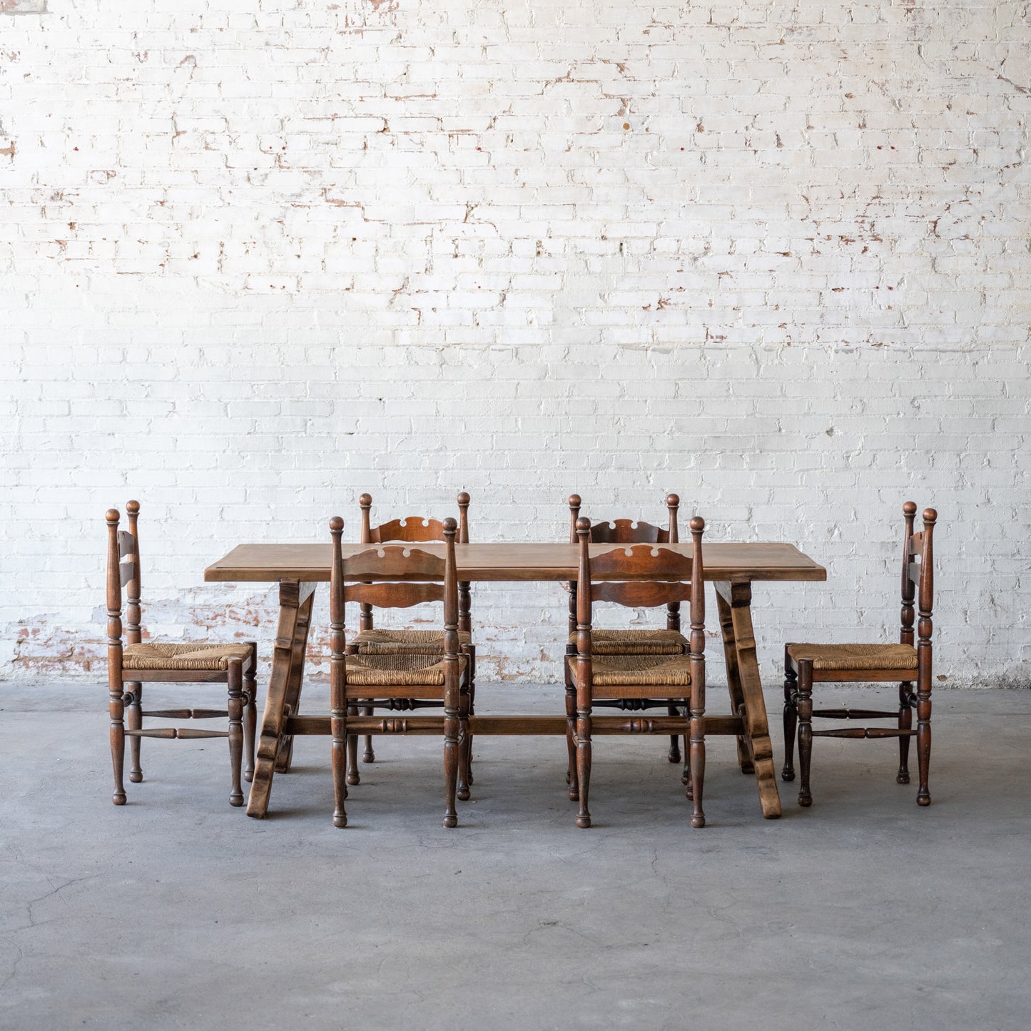 Antique Solid Oak Spanish Colonial Table with chairs at table