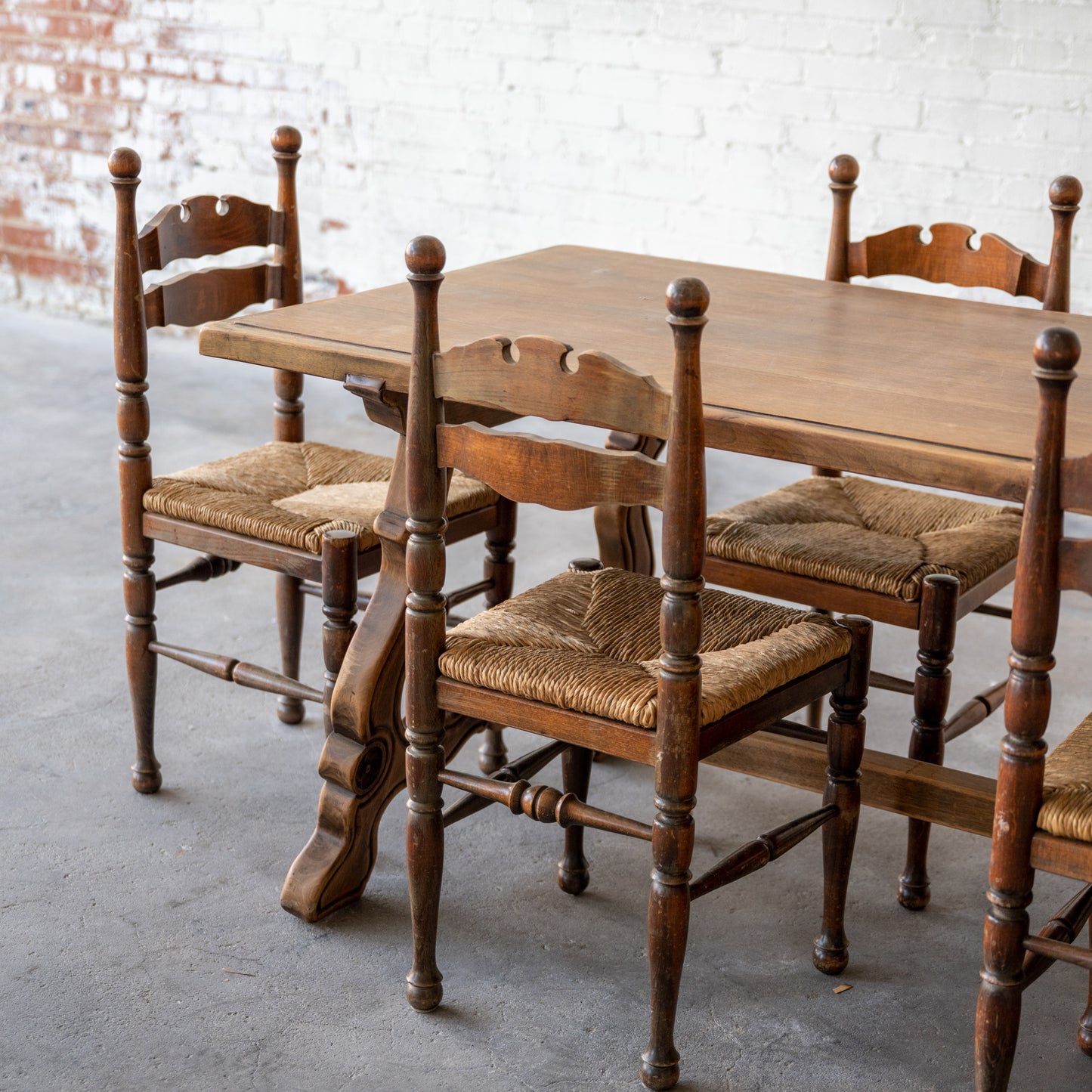 Antique Solid Oak Spanish Colonial Table close up of chairs at table