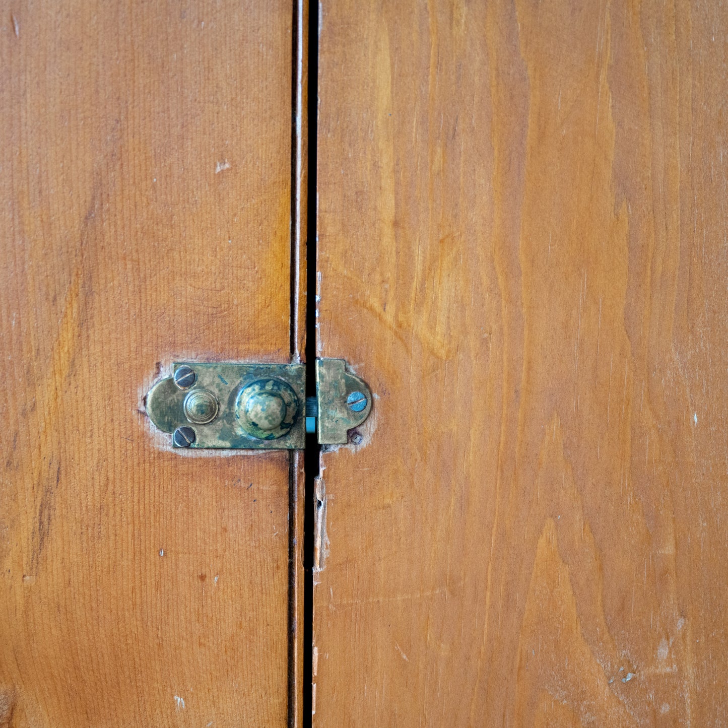 Early American Wooden Cupboard close up of door latch hardware