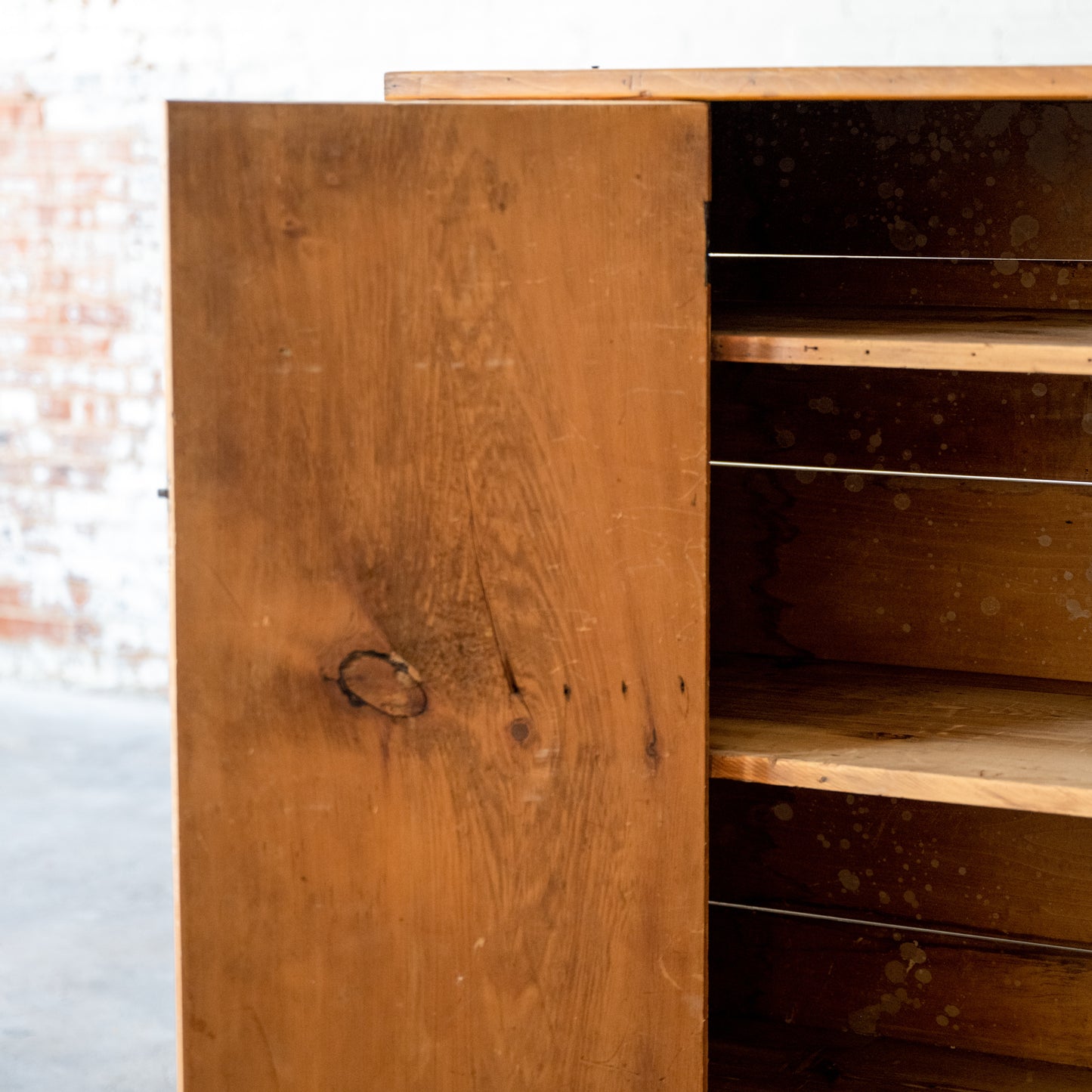 Early American Wooden Cupboard close up of open door showing shelves inside
