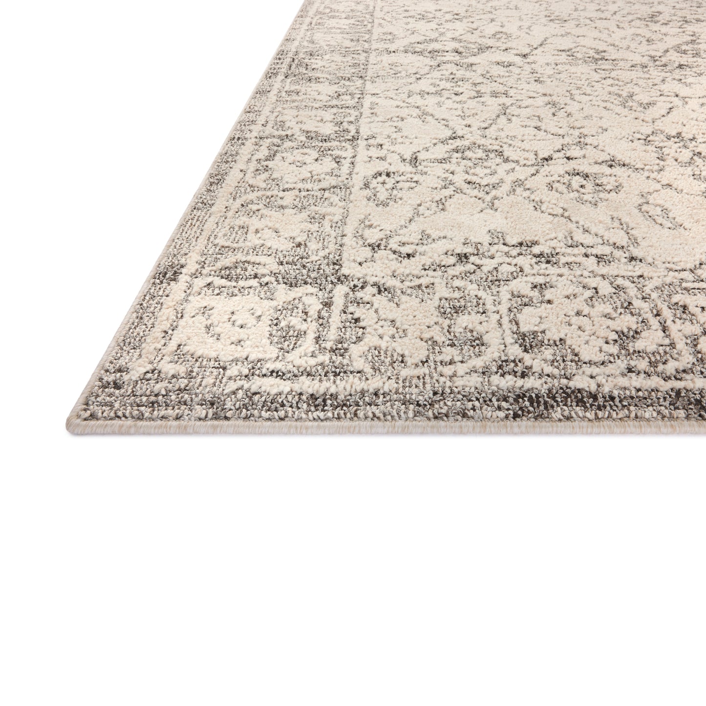 Gigi Ivory Stone Rug close up of corner