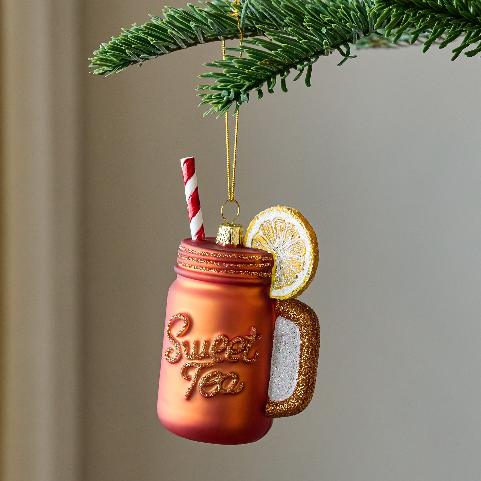 Southern Sweet Tea Ornament shown hung from tree