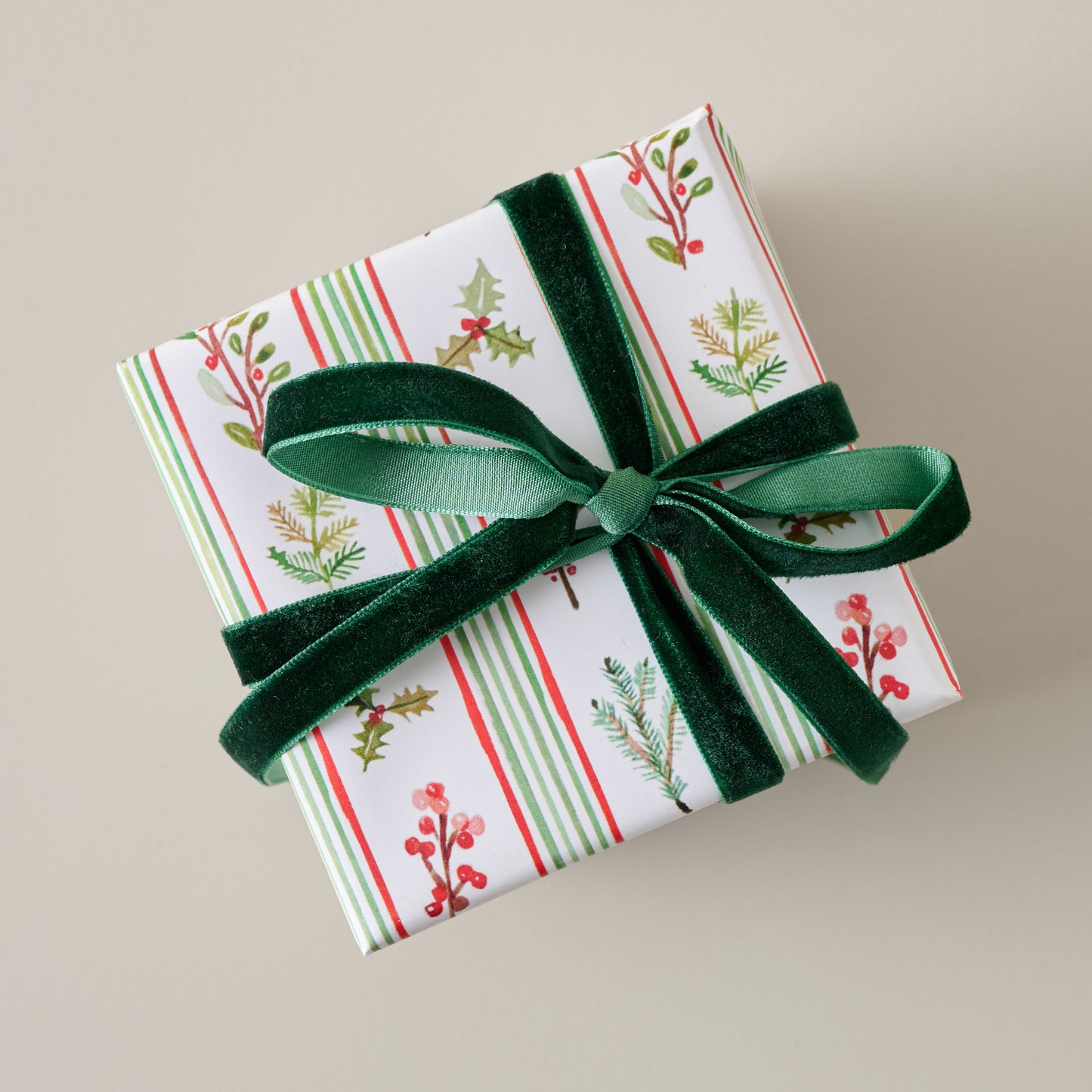 Holiday Garland Gift Wrap Sheets shown on gift