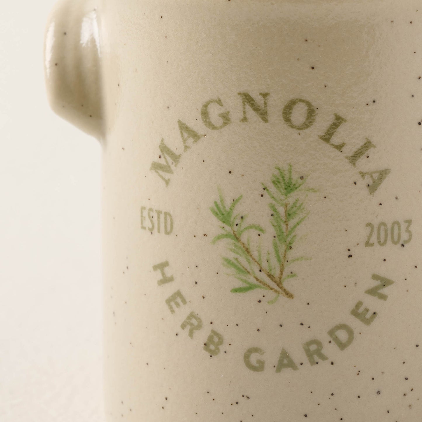 close up view of herb garden candle label