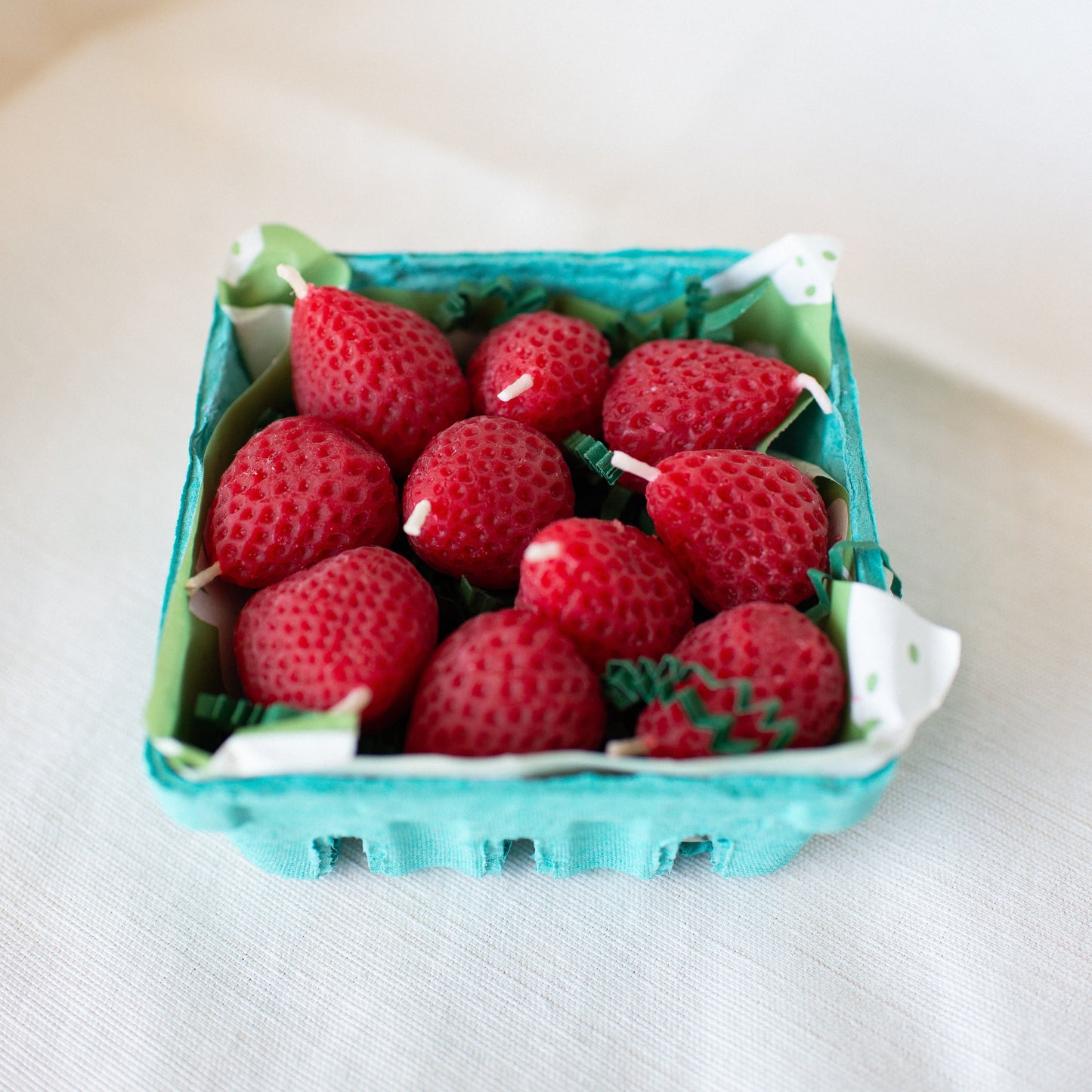 Strawberry Birthday Candle Set of 10 shown in carton