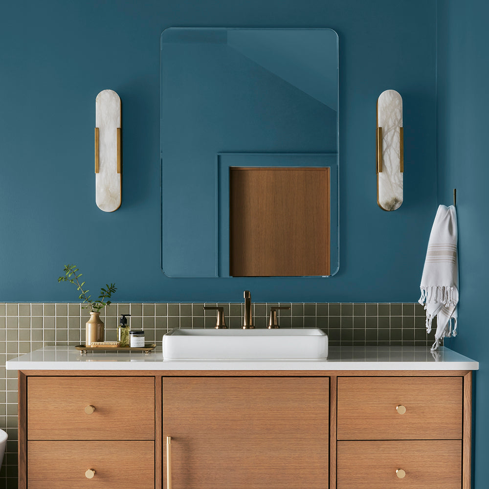 true blue paint color named superior shown painted on bathroom wall