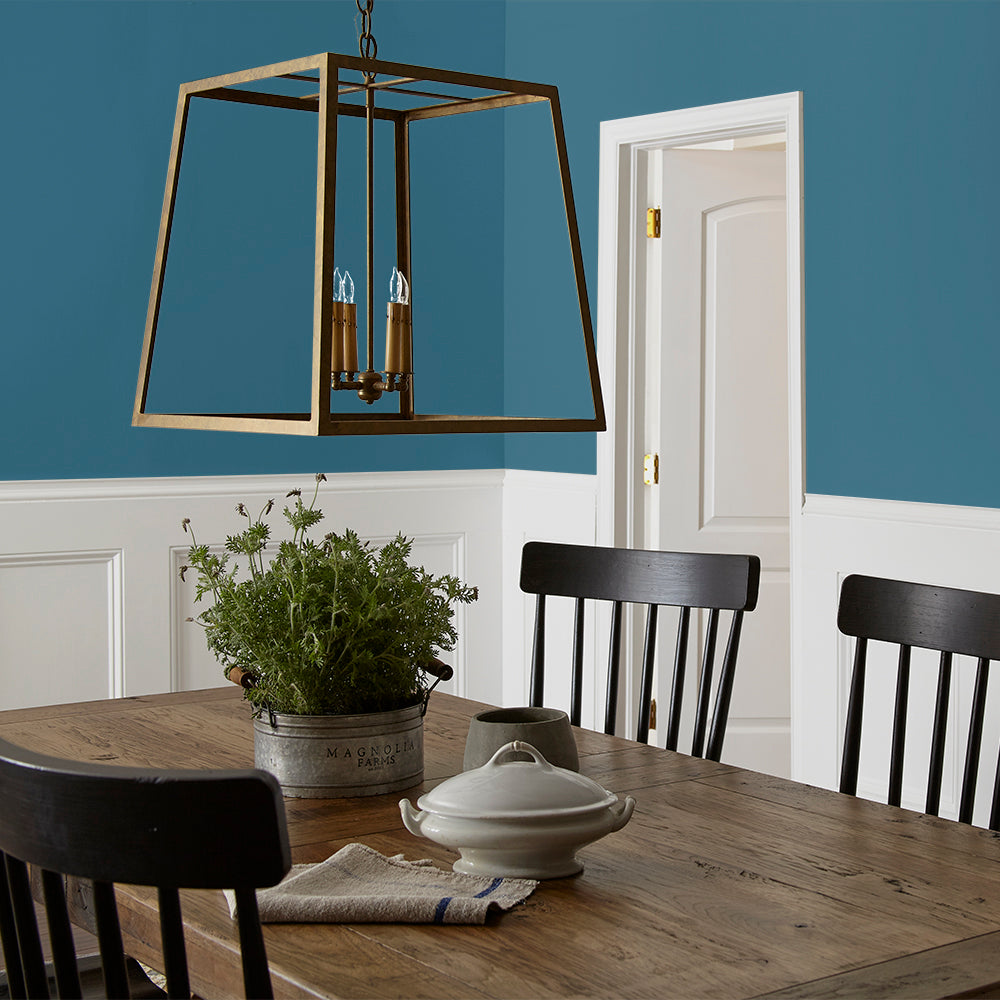 true blue paint color named superior shown painted on dining room wall